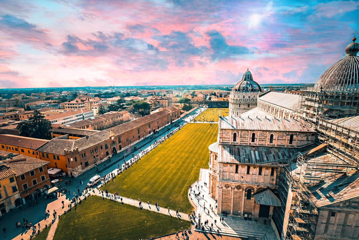 View of Pisa Cathedral and cityscape at sunset