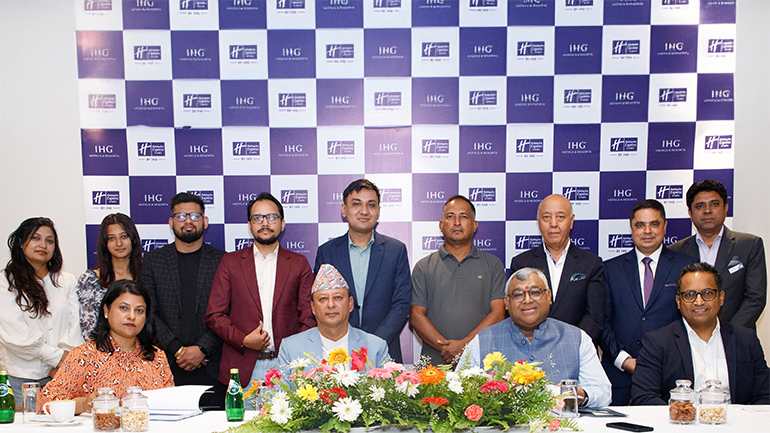 Group photo during the signing ceremony for the new Holiday Inn Express & Suites Dhulabari project in Nepal