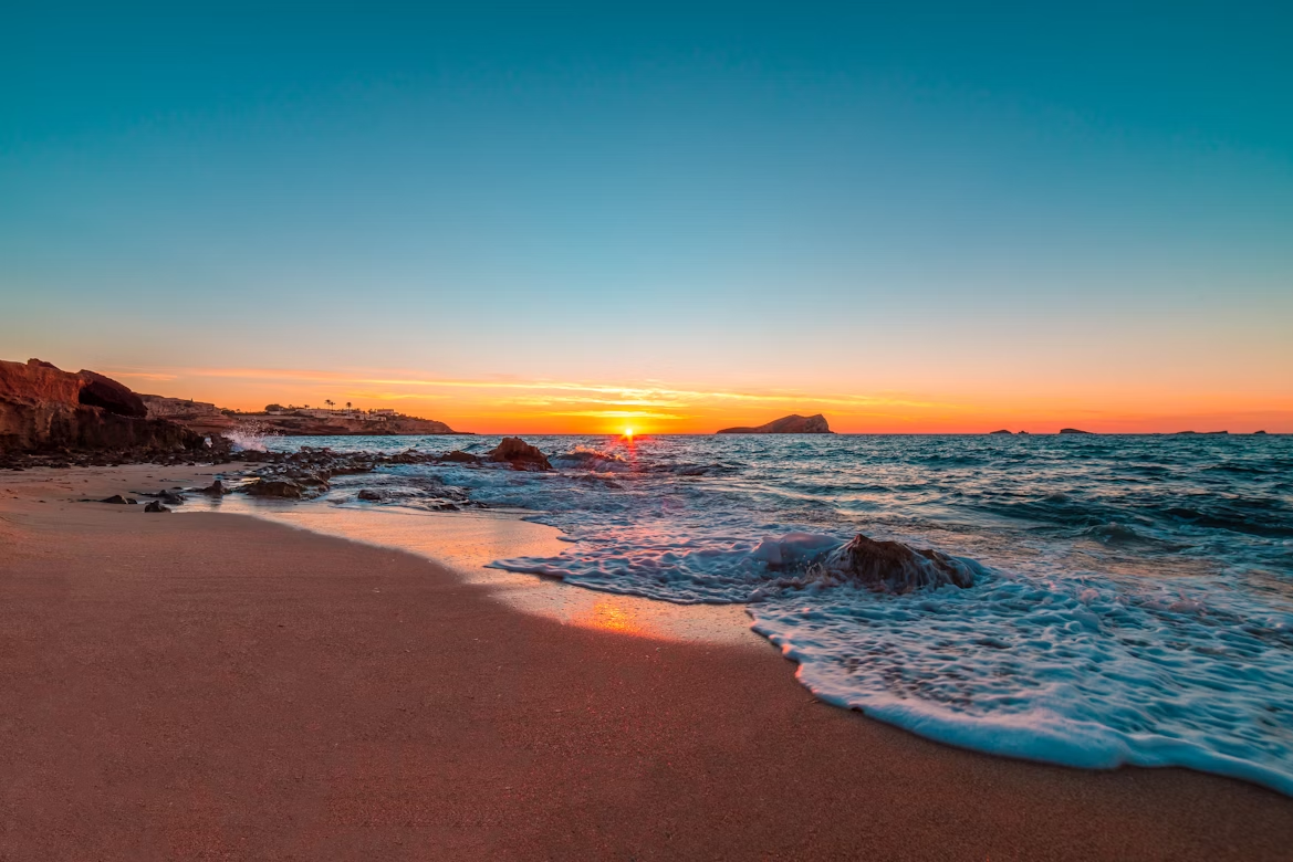 Sunset view at Cala Comte beach in Ibiza