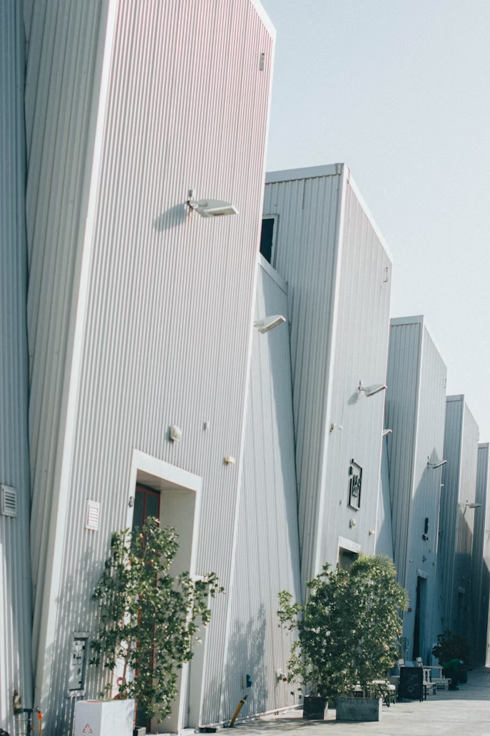 Modern industrial-style buildings at Alserkal Avenue in Dubai, under clear sky