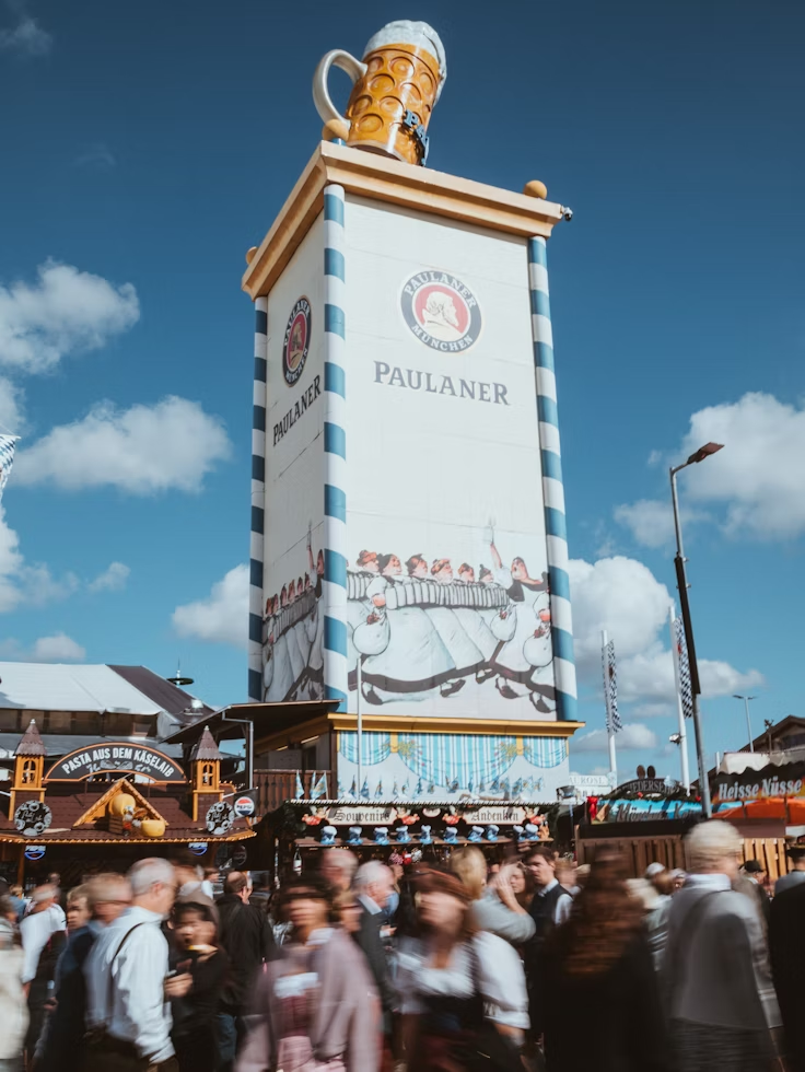 Crowds gather at Oktoberfest near the Paulaner beer tower in Munich