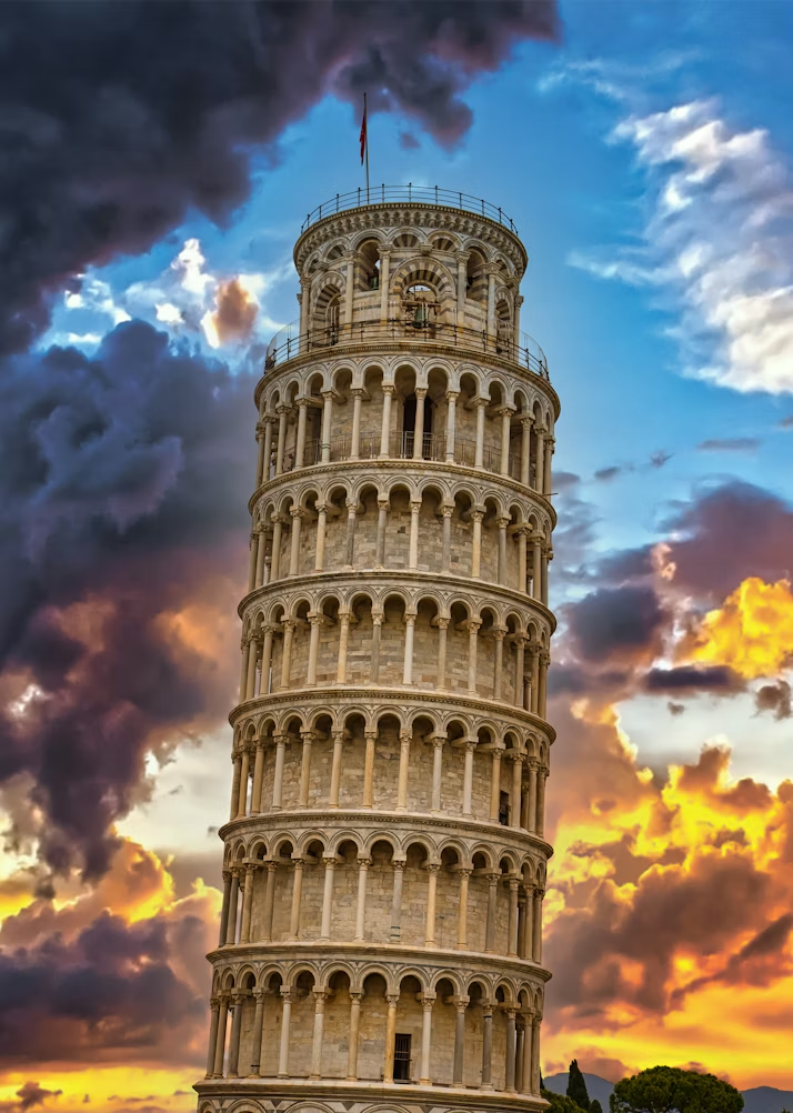 The Leaning Tower of Pisa against a dramatic sunset sky