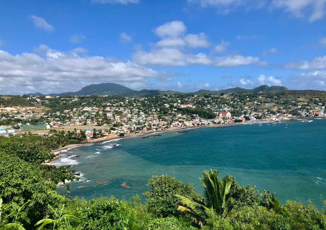 Coastal view of St Lucia with colorful town and surrounding hills