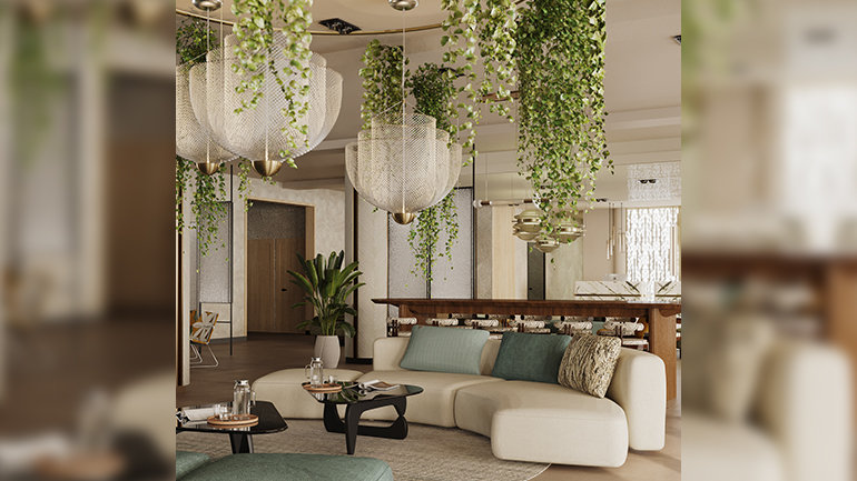 Modern hotel lobby with greenery and elegant seating