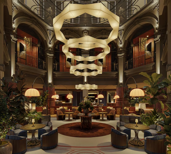 Elegant hotel lobby with modern lighting and classic architecture