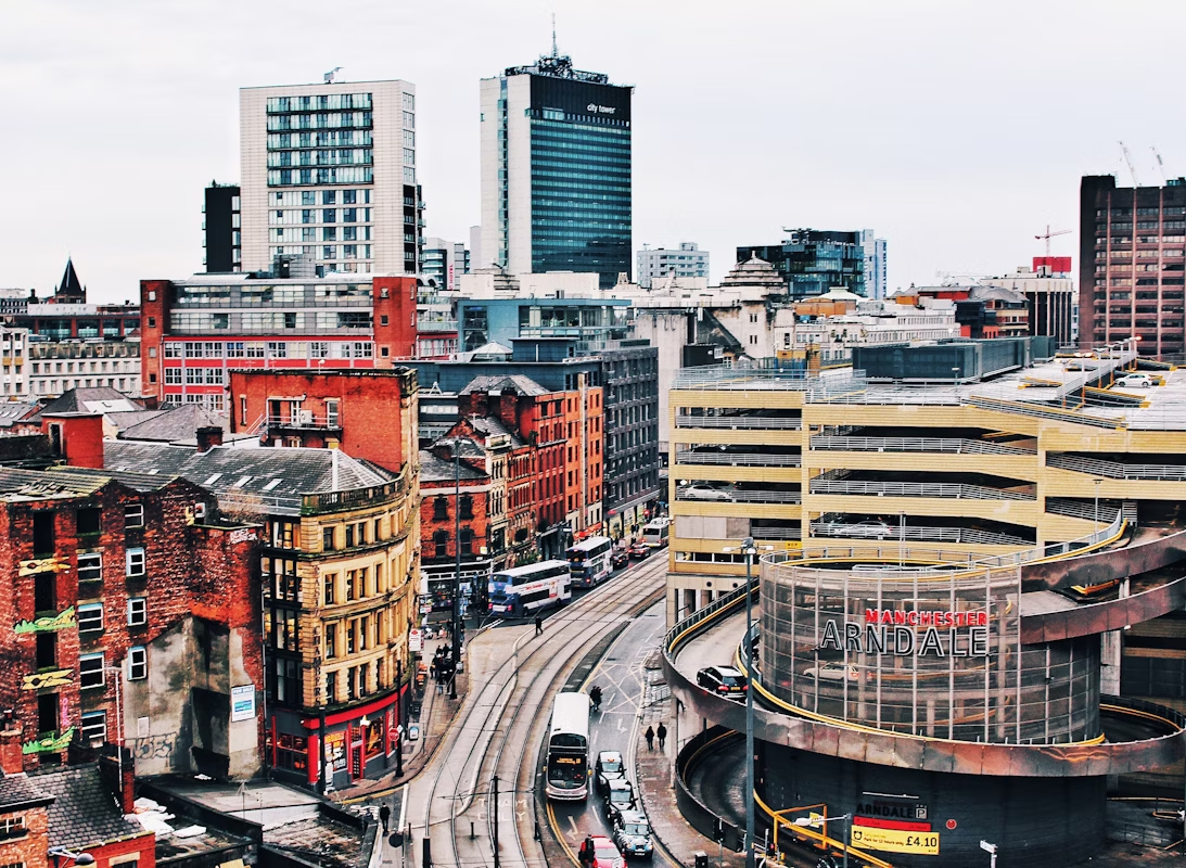 City view of Manchester with trams and modern buildings