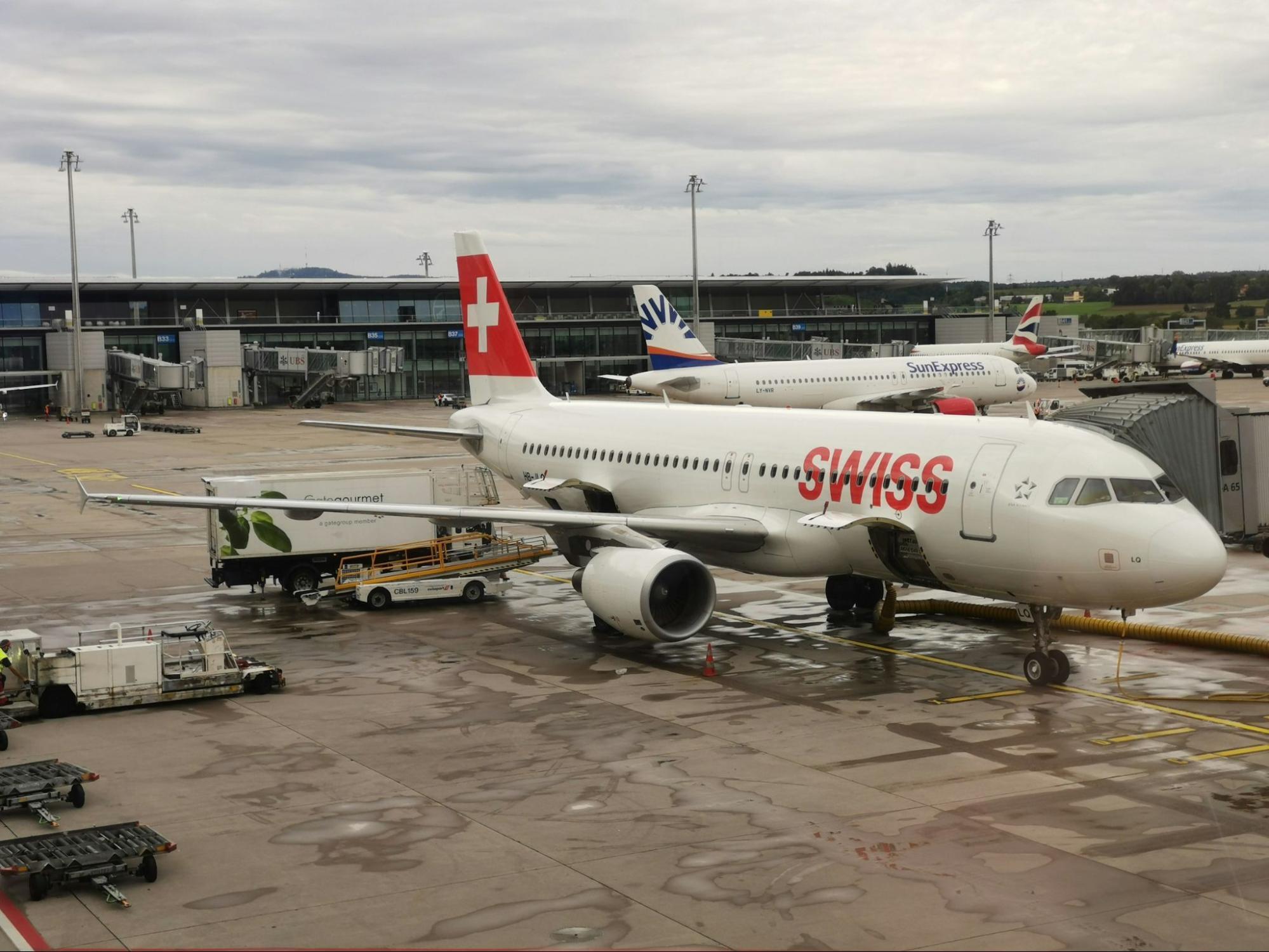SWISS aircraft undergoing ground handling at airport