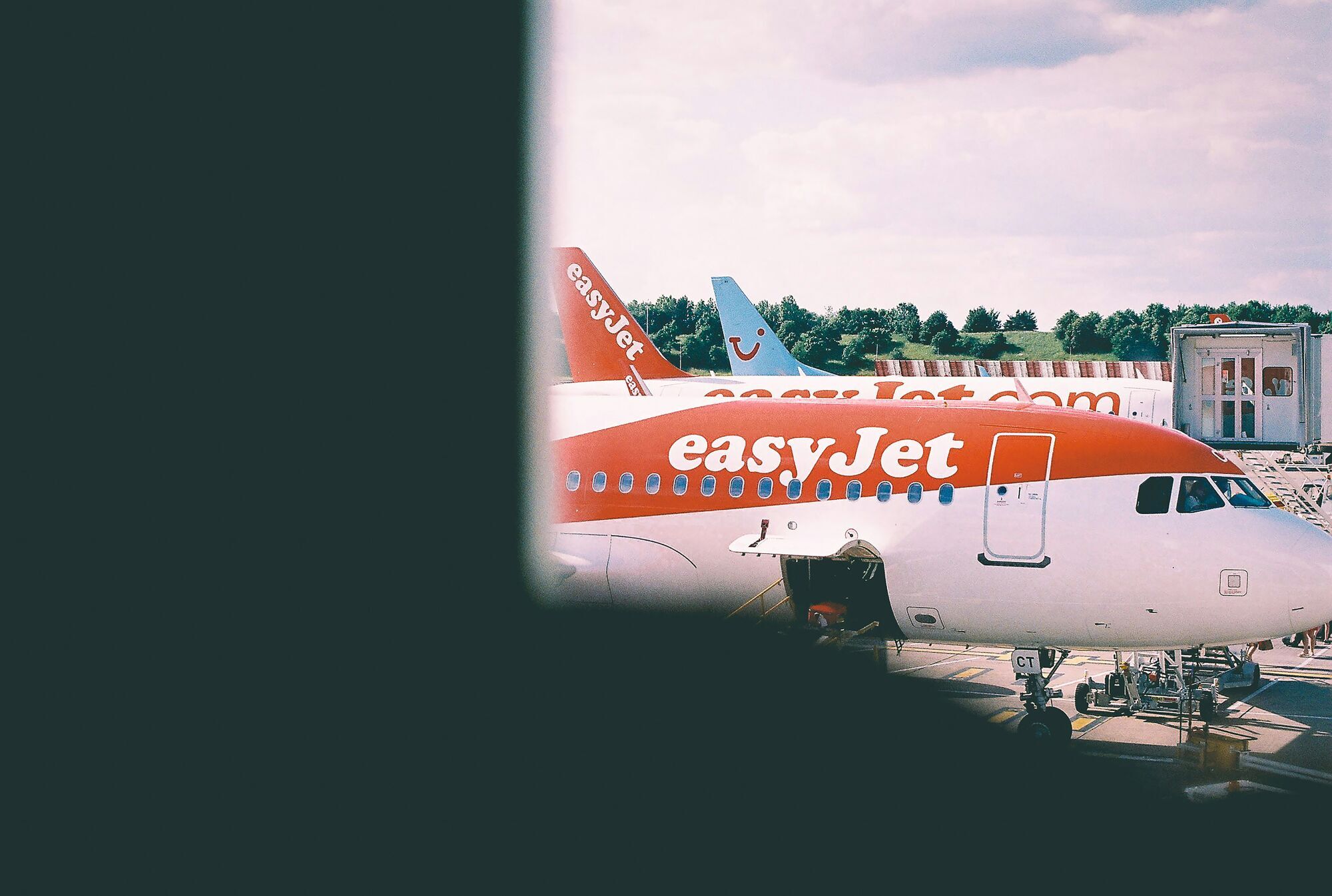 EasyJet aircraft parked at an airport stand