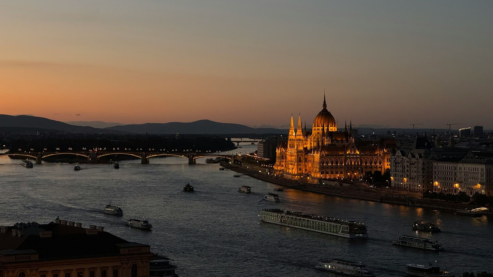 Cruise boats on Budapest's Danube at dusk