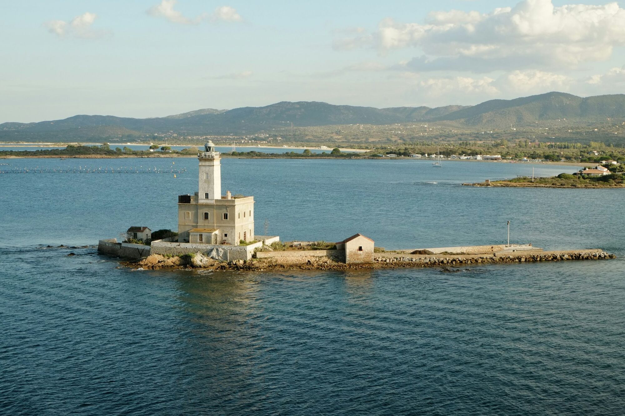 Stone lighthouse overlooking the sea near Olbia