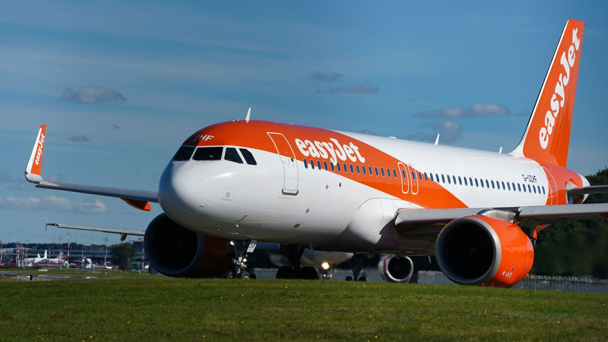 easyJet passenger aircraft taxiing on an airport runway