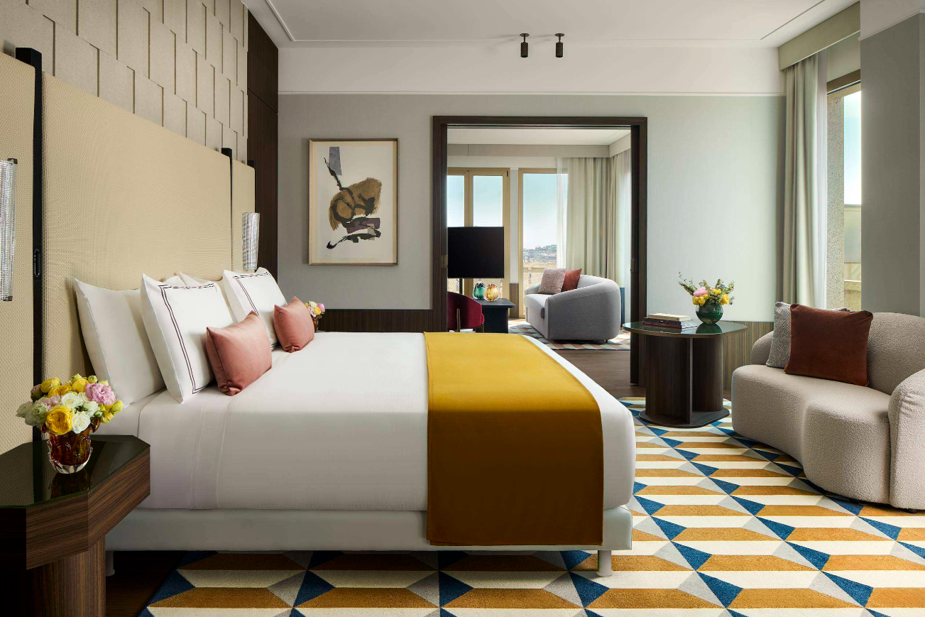 Tivoli President Milano Presidential Suite bedroom with adjoining lounge