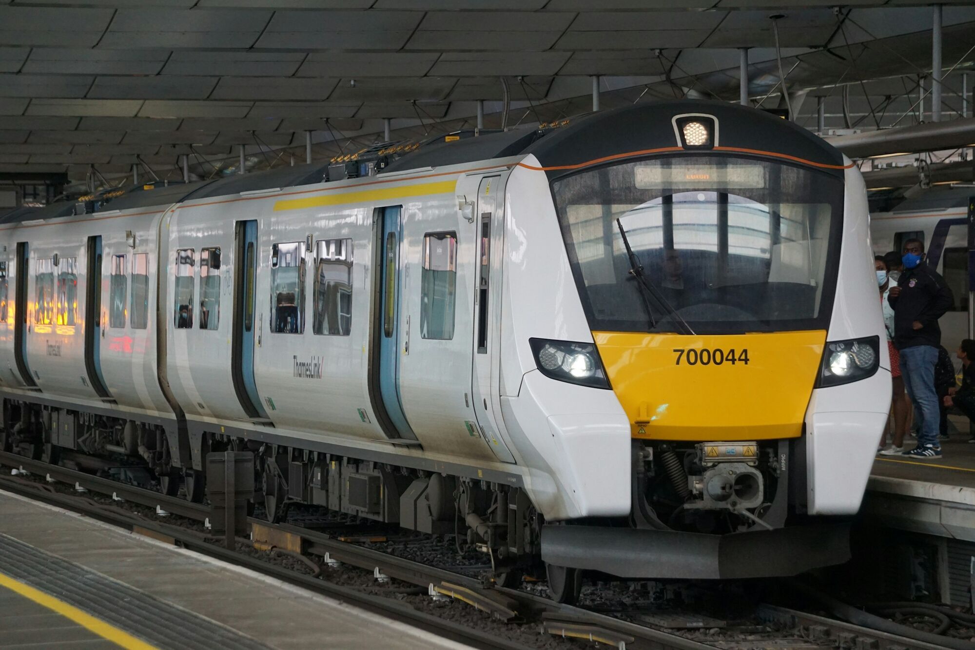 Thameslink passenger train standing at a railway platform