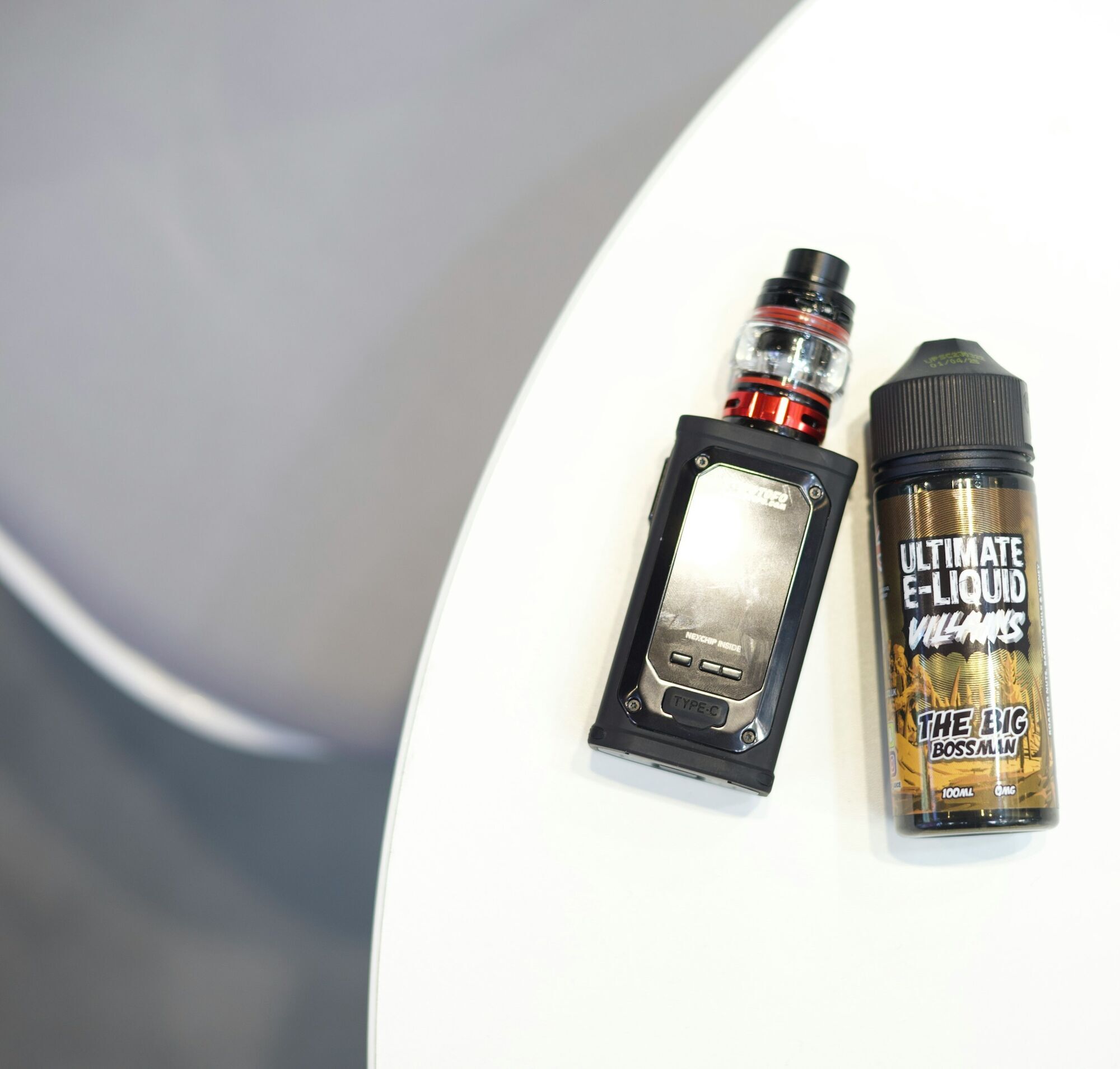 E-liquid being poured into a vape device