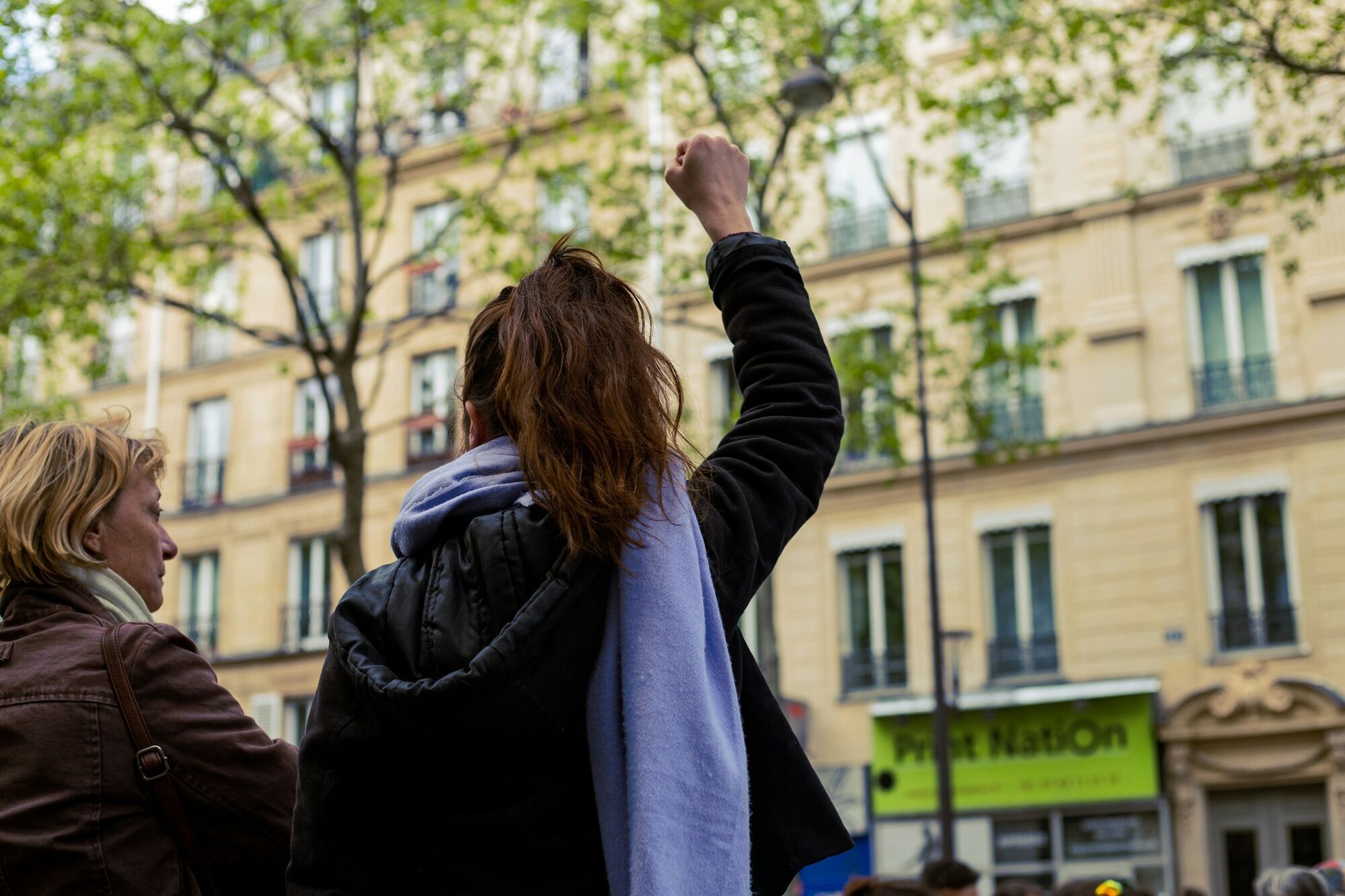 Protester raising a fist during a demonstration