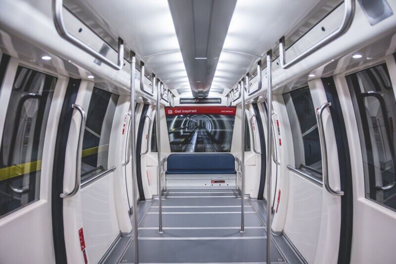 Interior of an empty Skymetro train at Zurich Airport