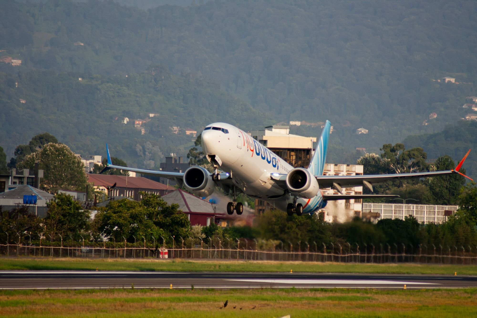 Flydubai aircraft taking off from an airport