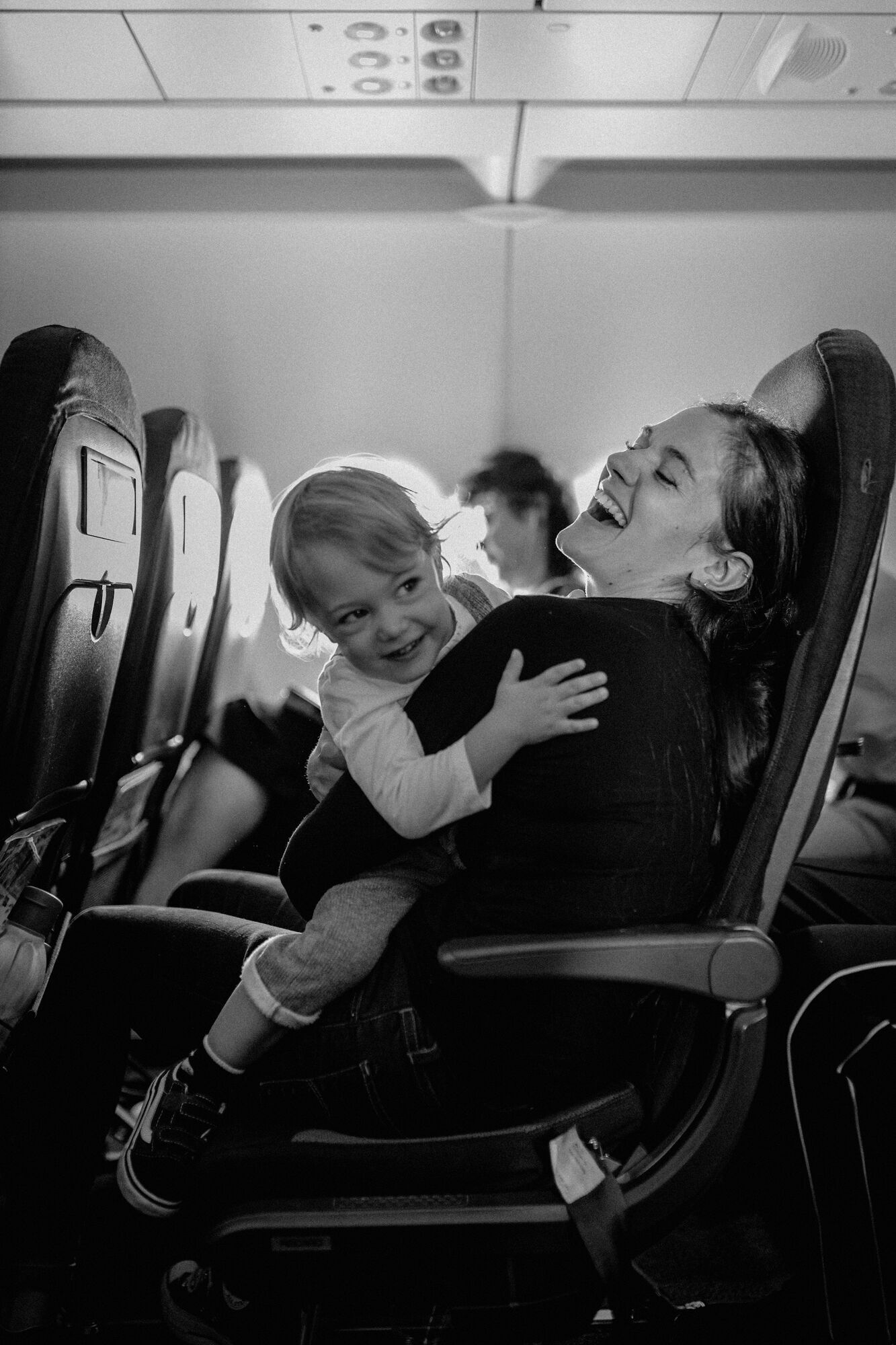 Parent travelling with a young child on a plane