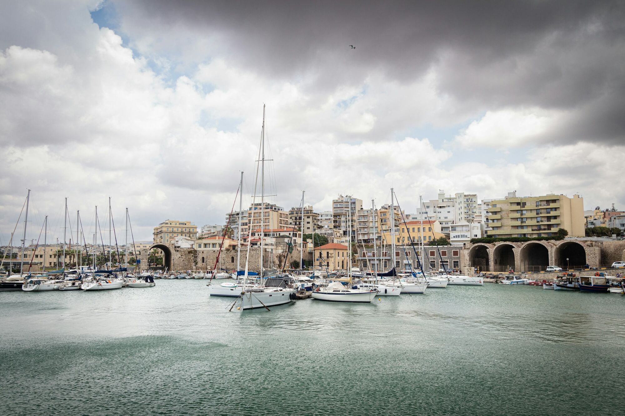 Storm clouds over harbour in Crete