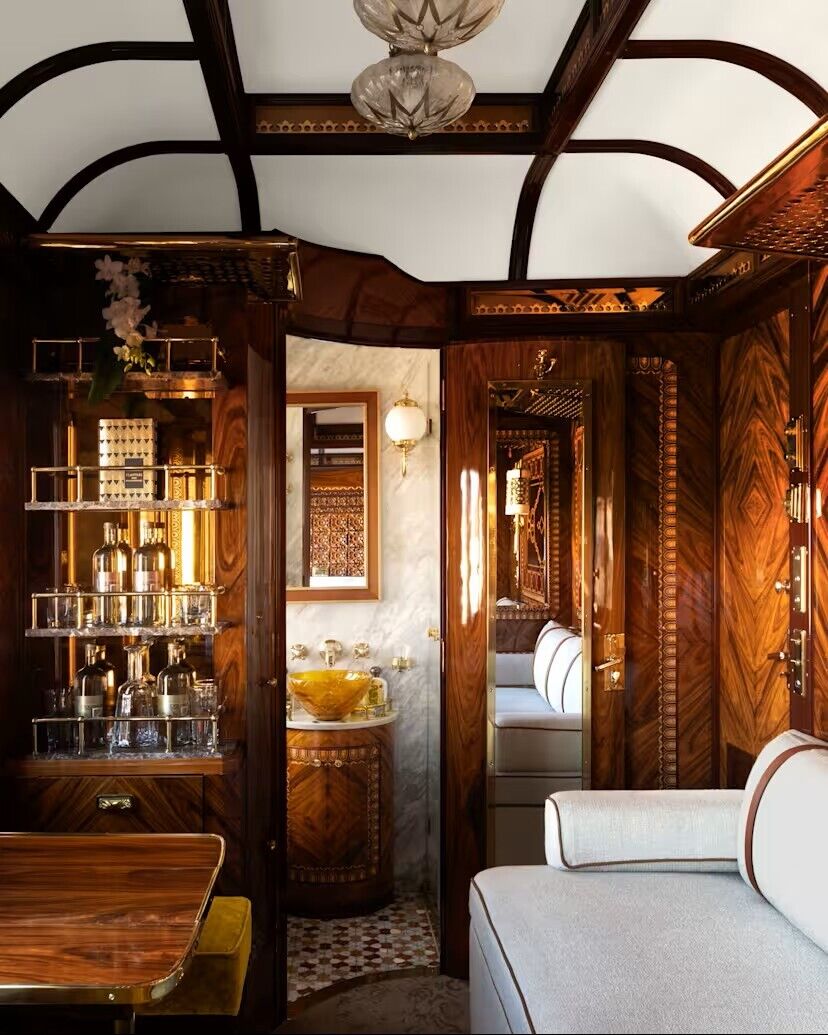 Wood-panelled train suite with private bathroom