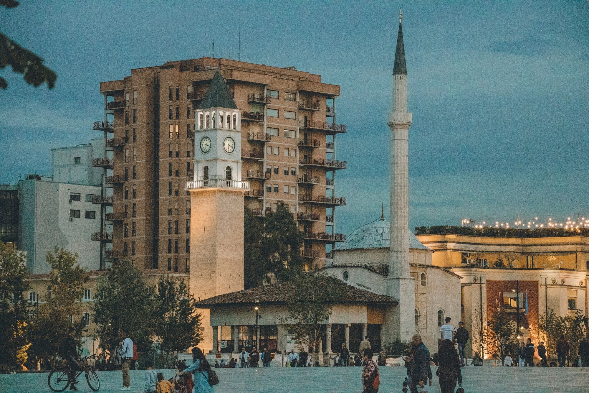 Evening view of Tirana skyline with mosque and clock tower