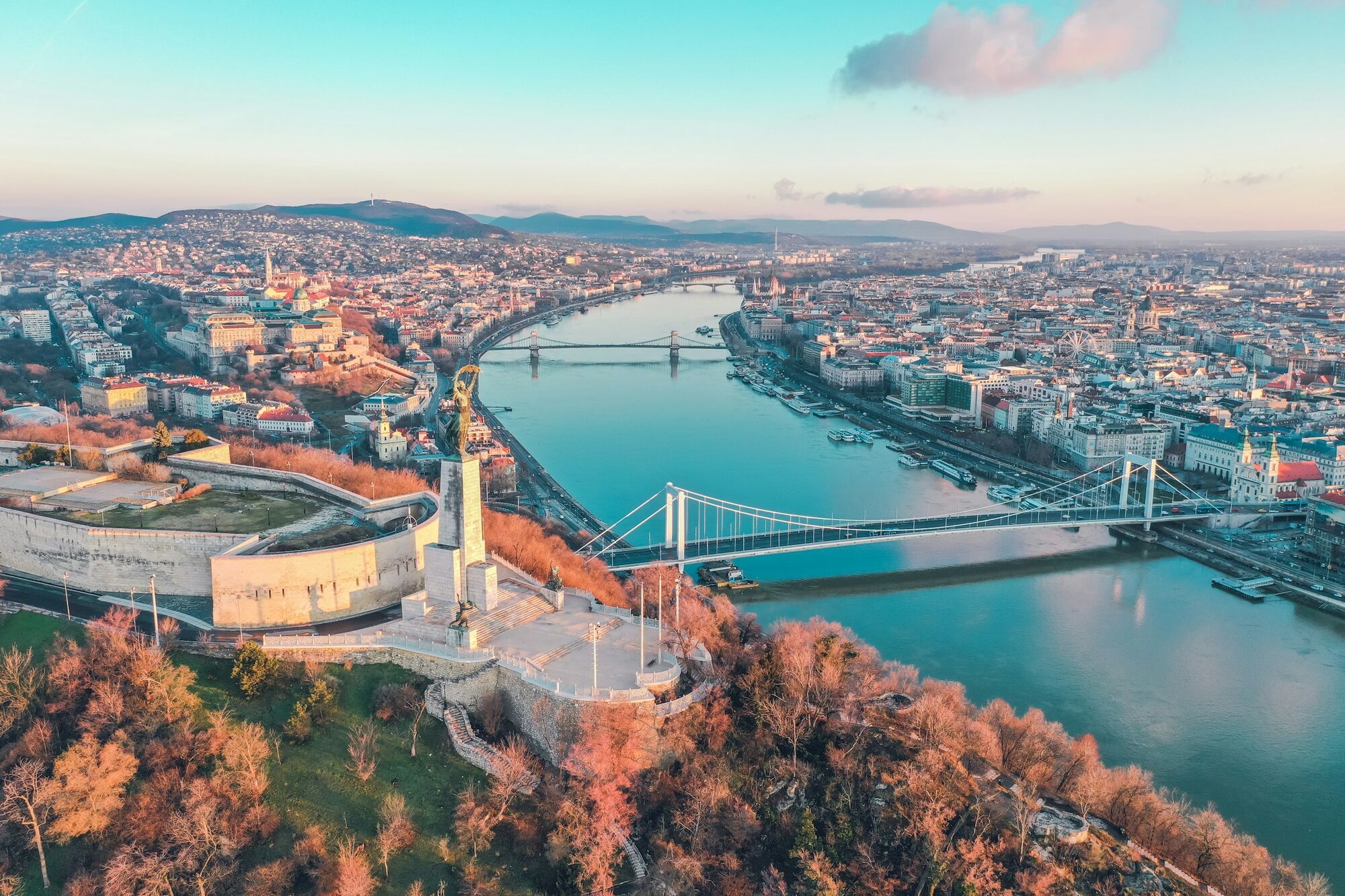 Aerial view of Budapest with Danube River and Chain Bridge at sunset