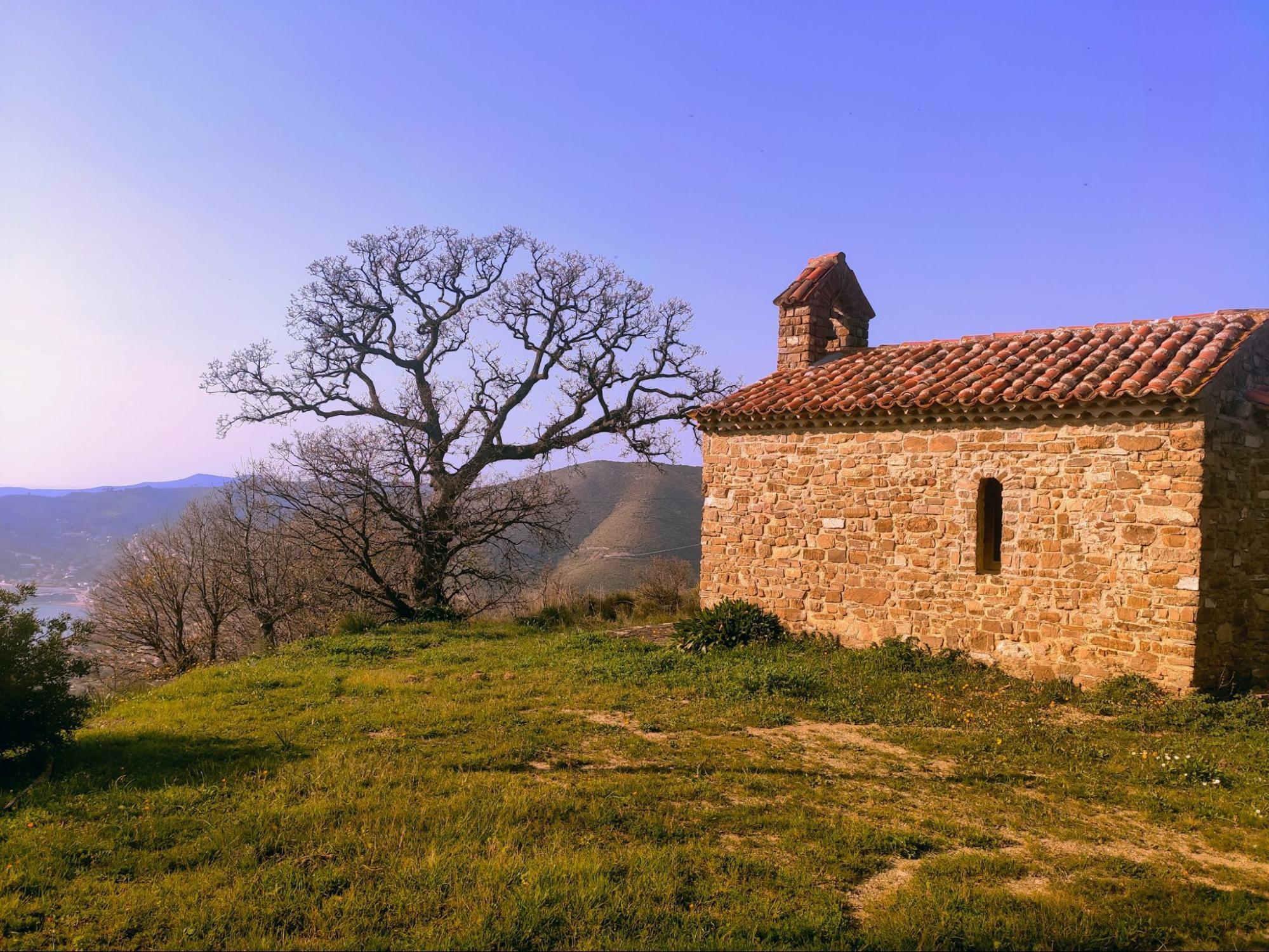 Stone chapel in Cilento countryside landscape