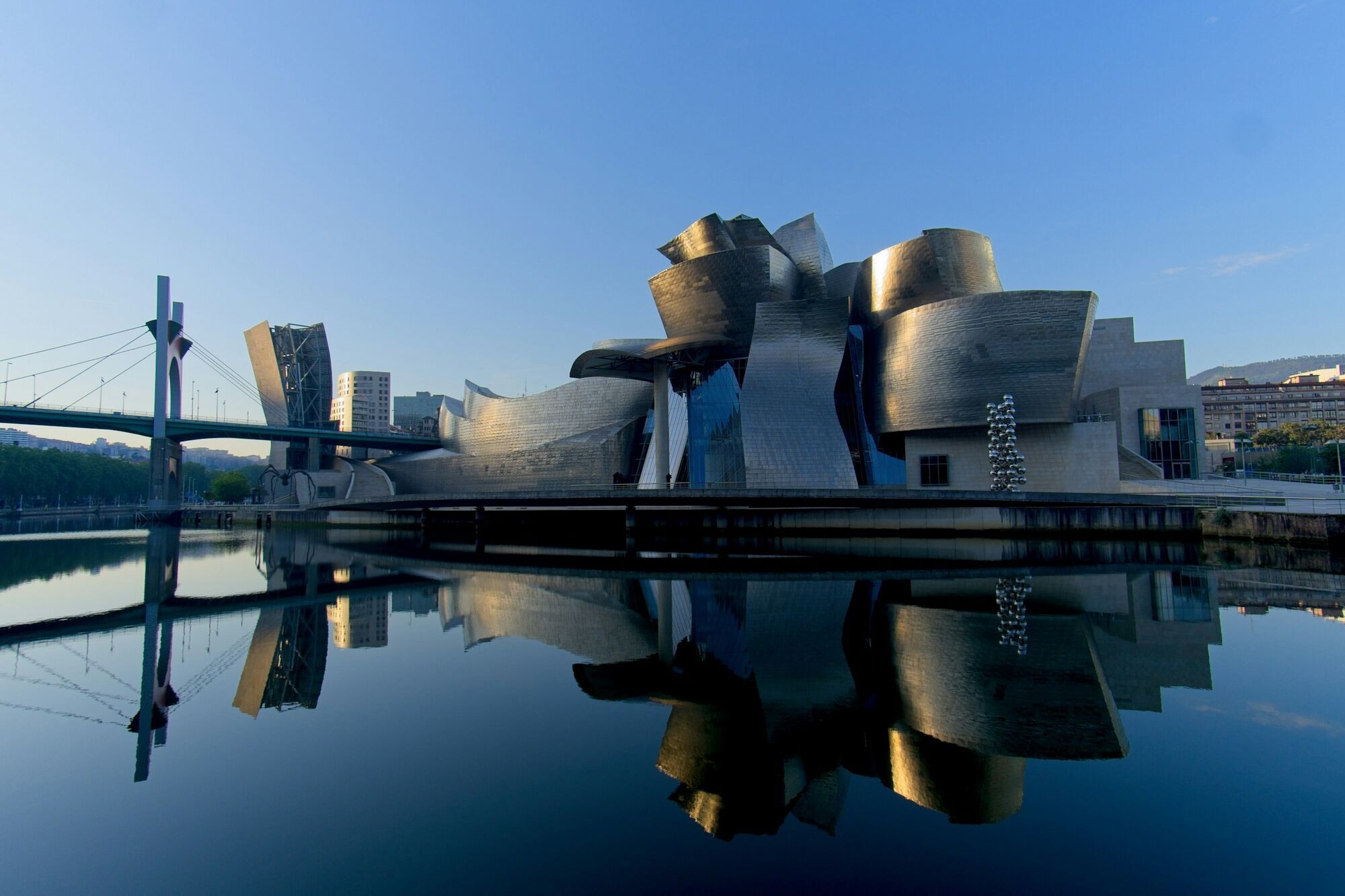 Guggenheim Museum Bilbao reflected in the river at dusk