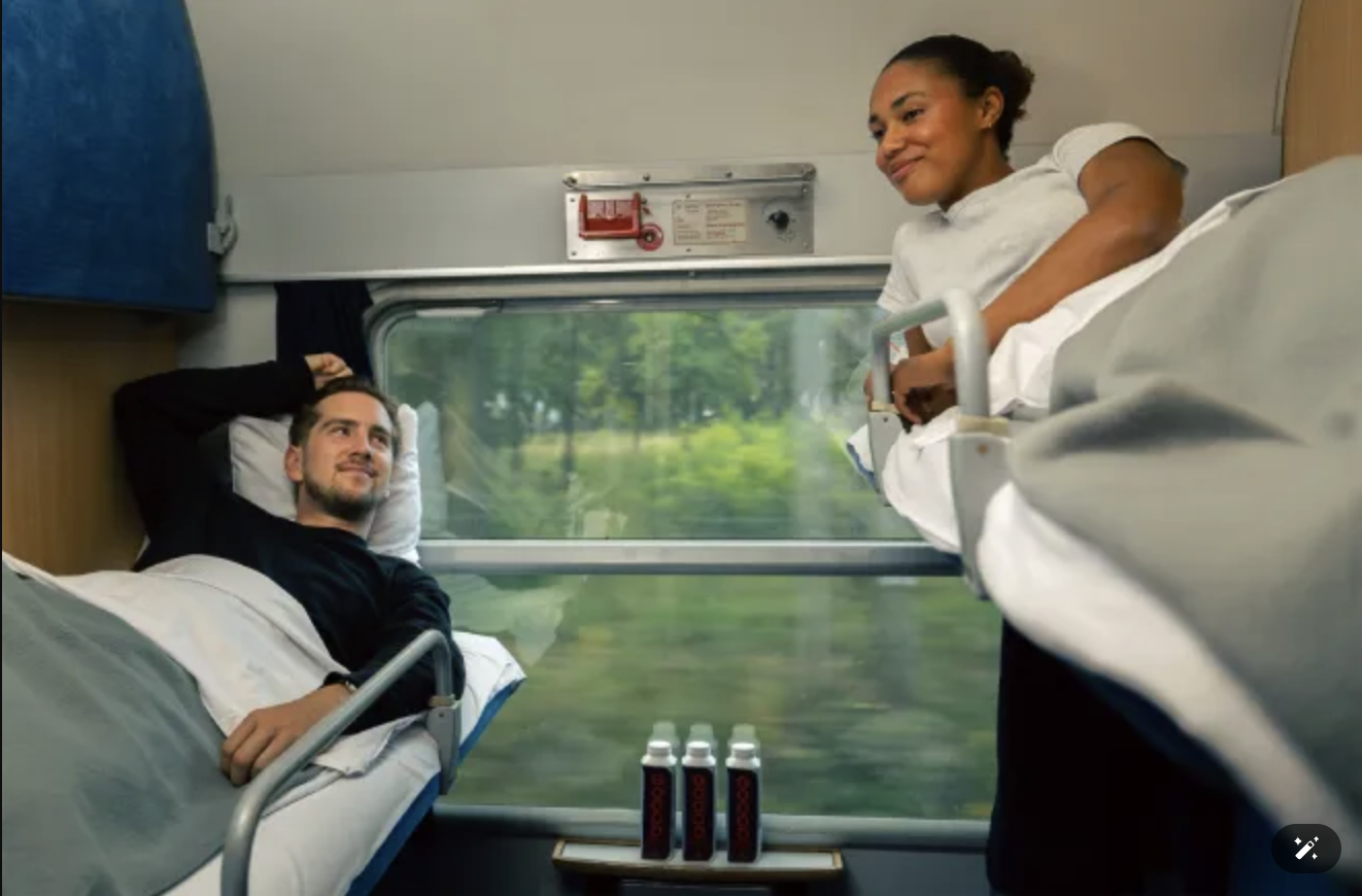 Passengers relaxing in sleeper cabin on an overnight train