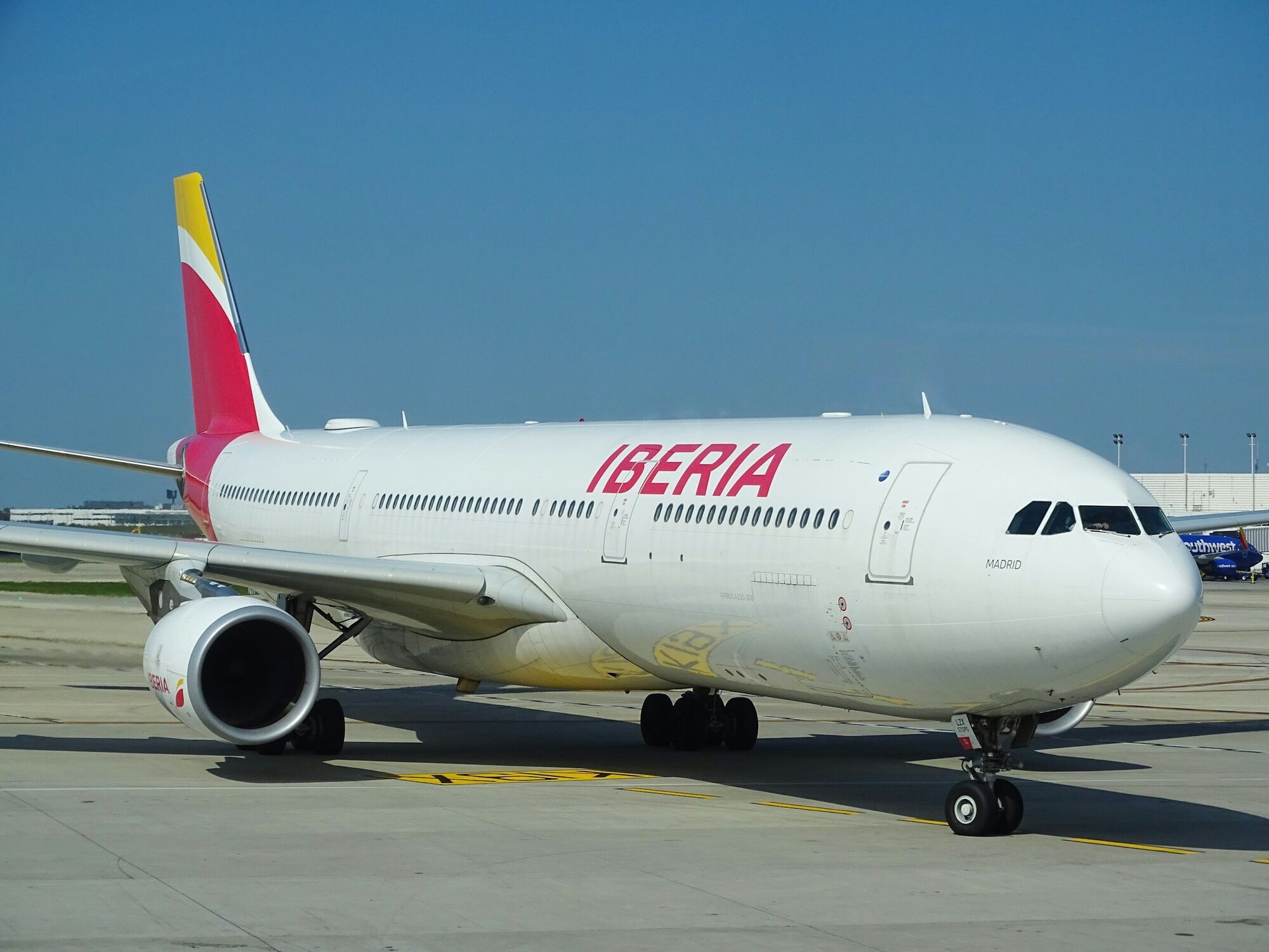 Iberia aircraft parked on airport runway