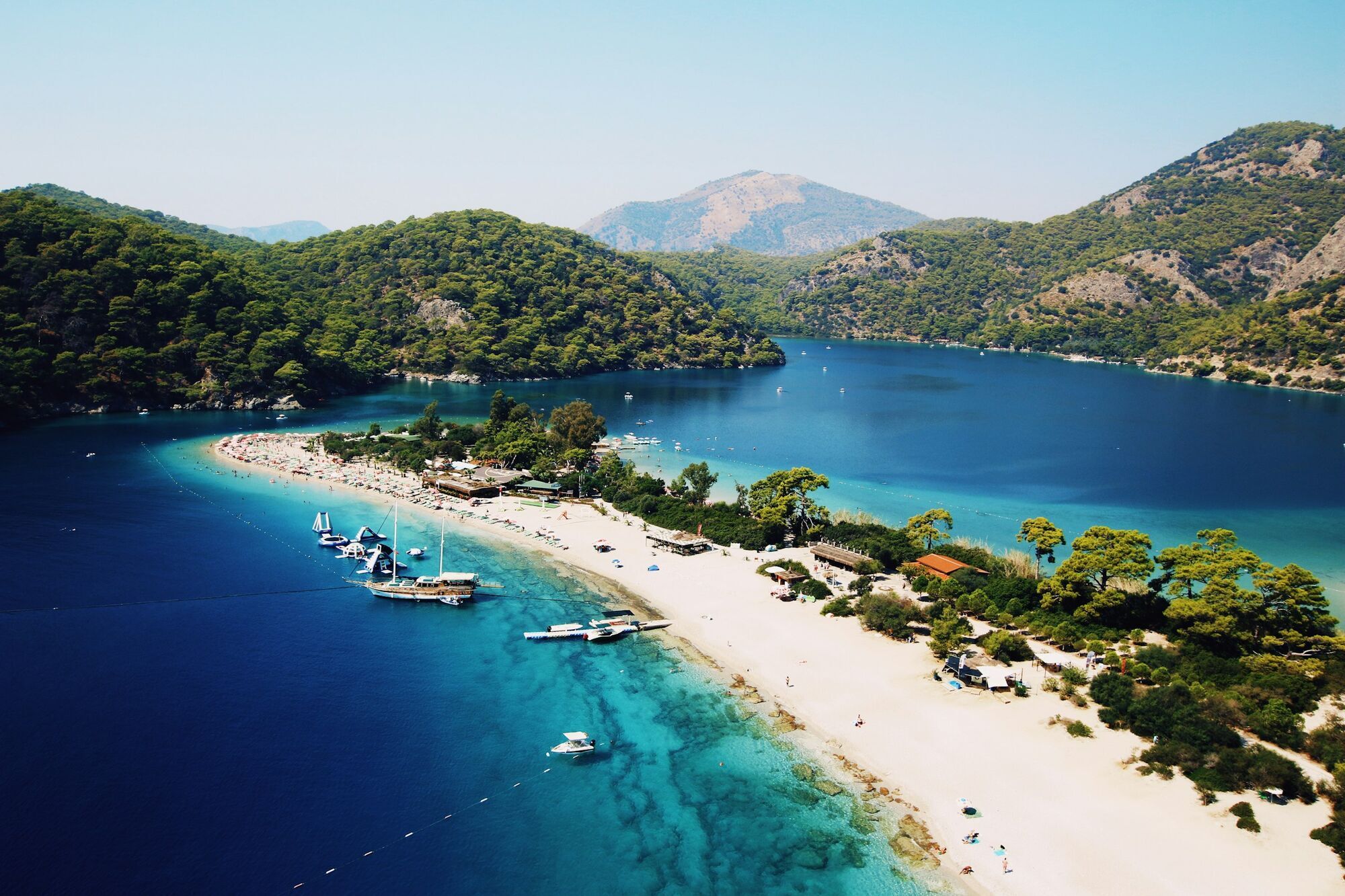 Aerial view of a Turkish beach with clear water and sandbar