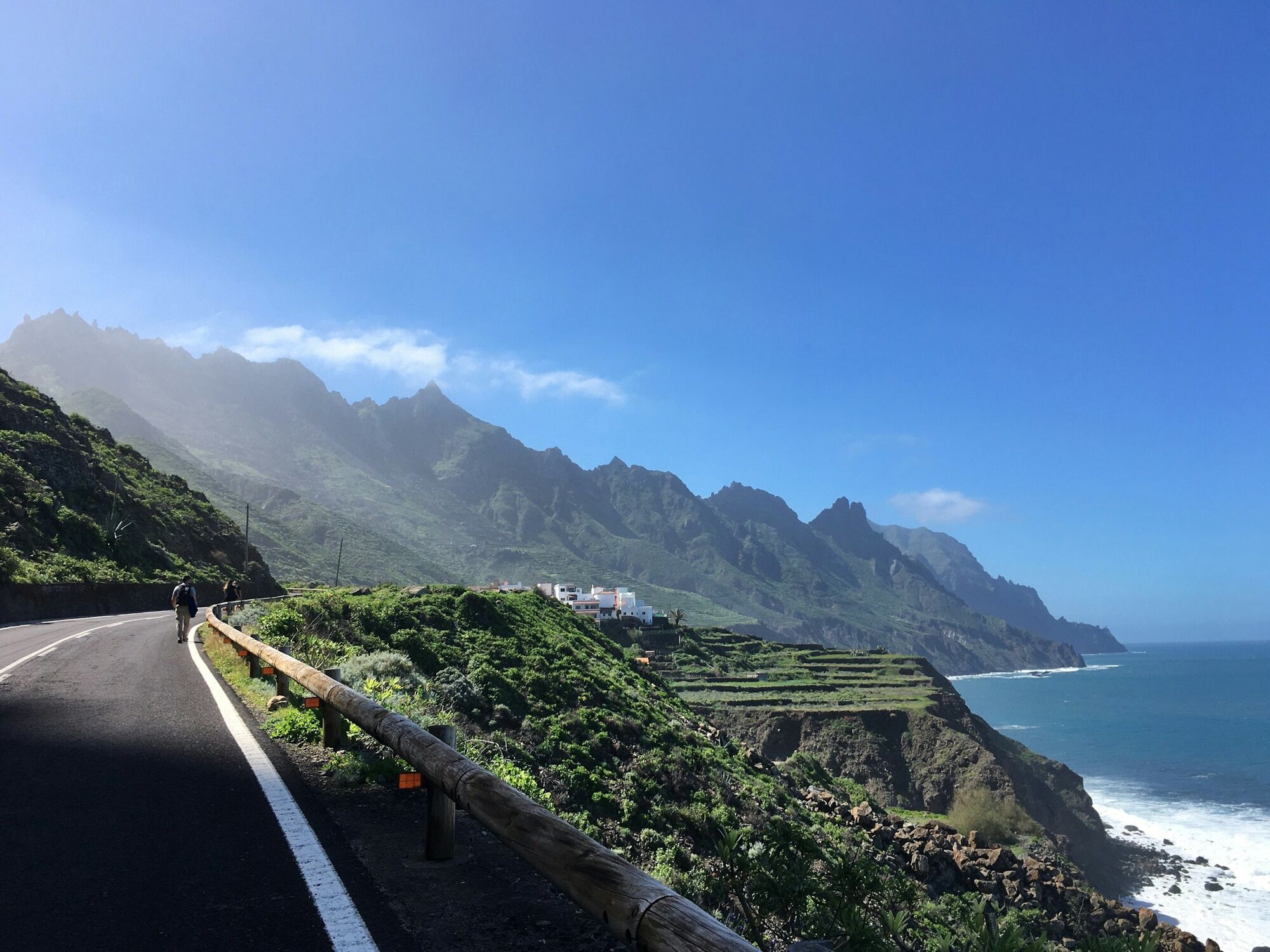 Mountain road along coastline with ocean views