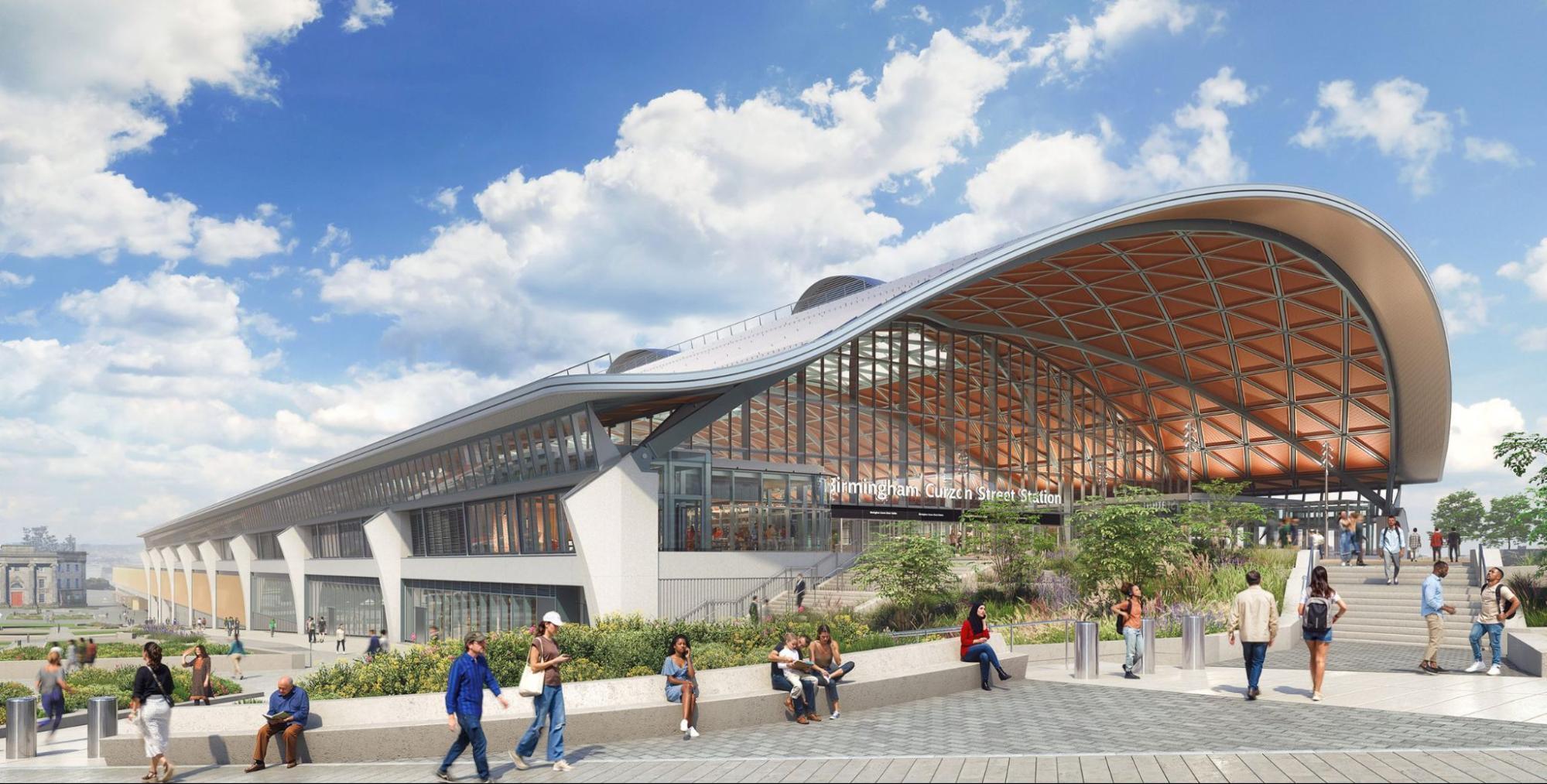 Exterior view of Birmingham Curzon Street HS2 station with curved roof architecture