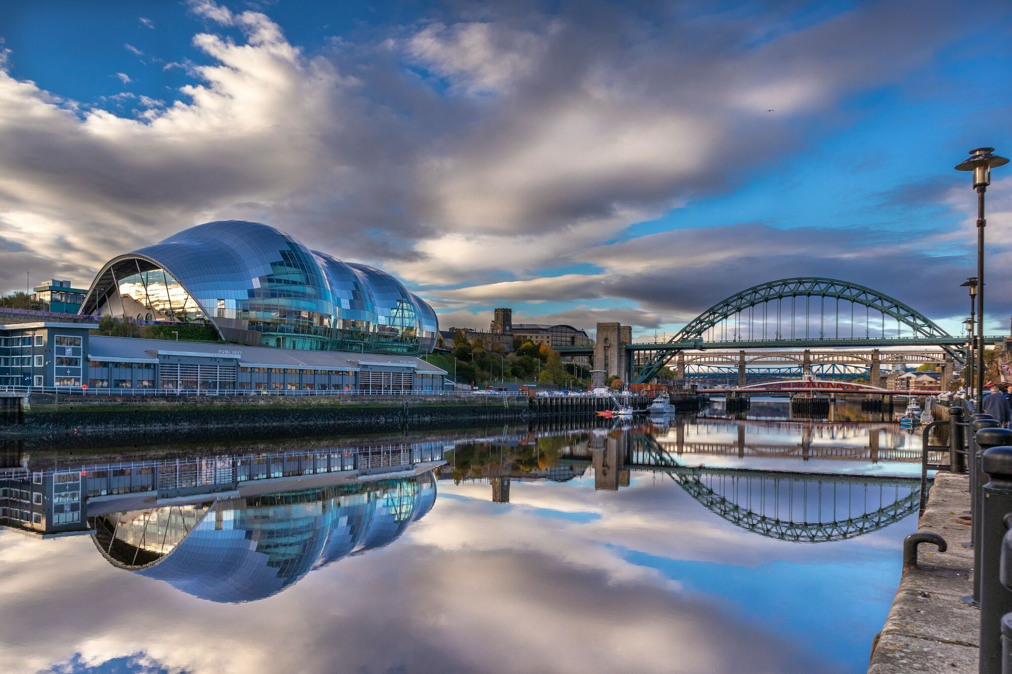 Newcastle riverside skyline with bridges reflected in water