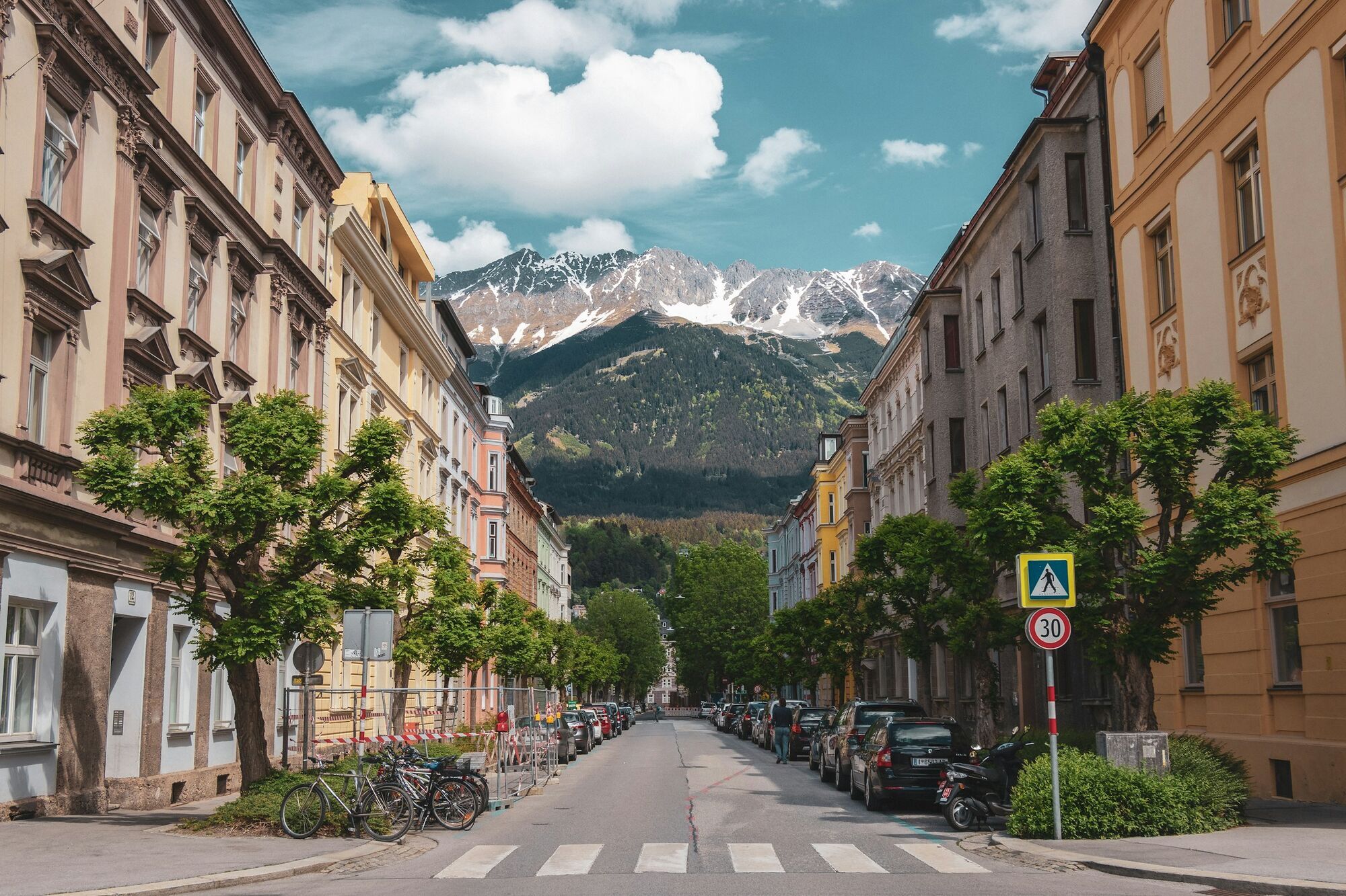 Innsbruck street with alpine mountains in the background