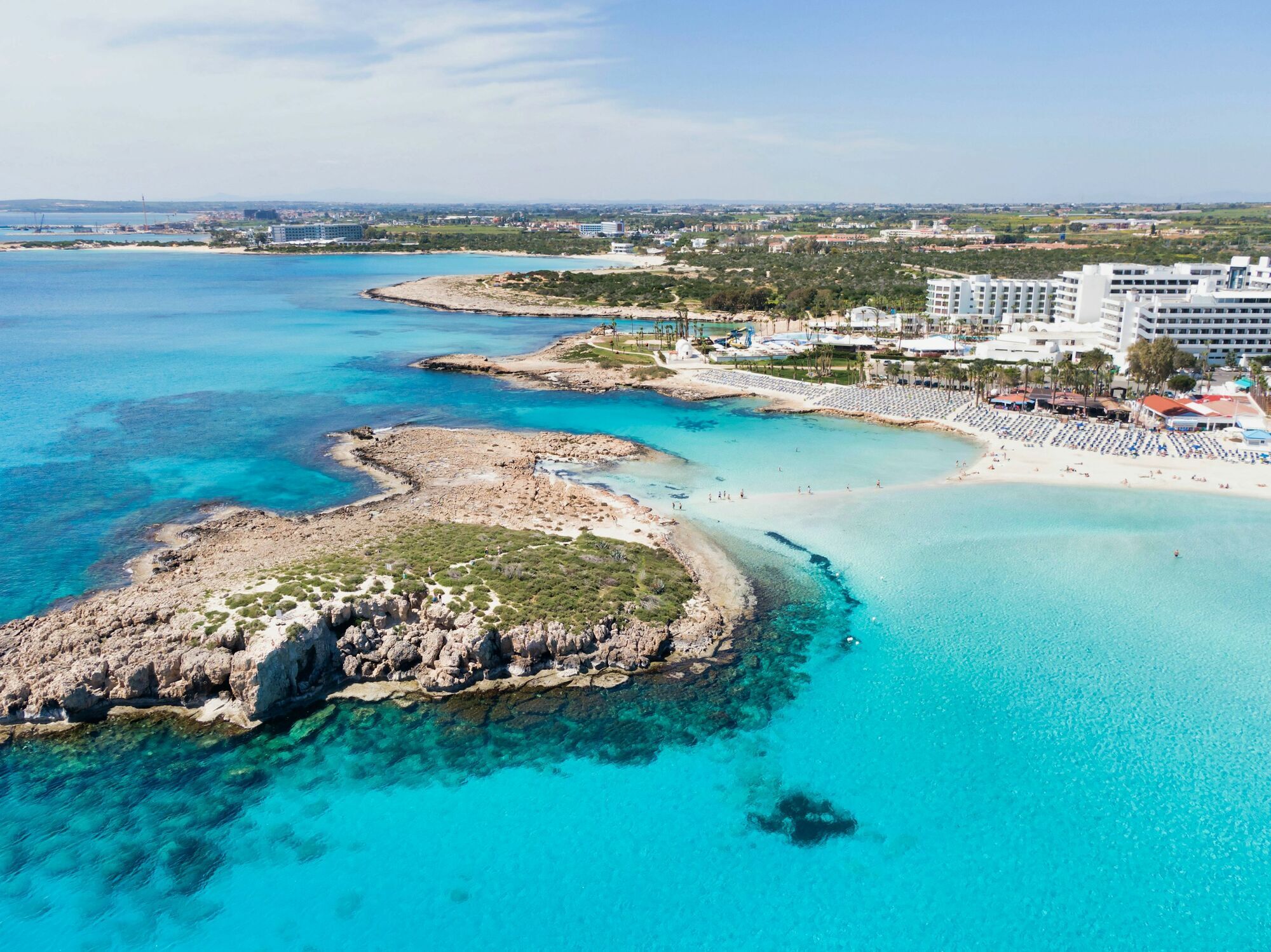 Cyprus coastline with turquoise sea and resort hotels