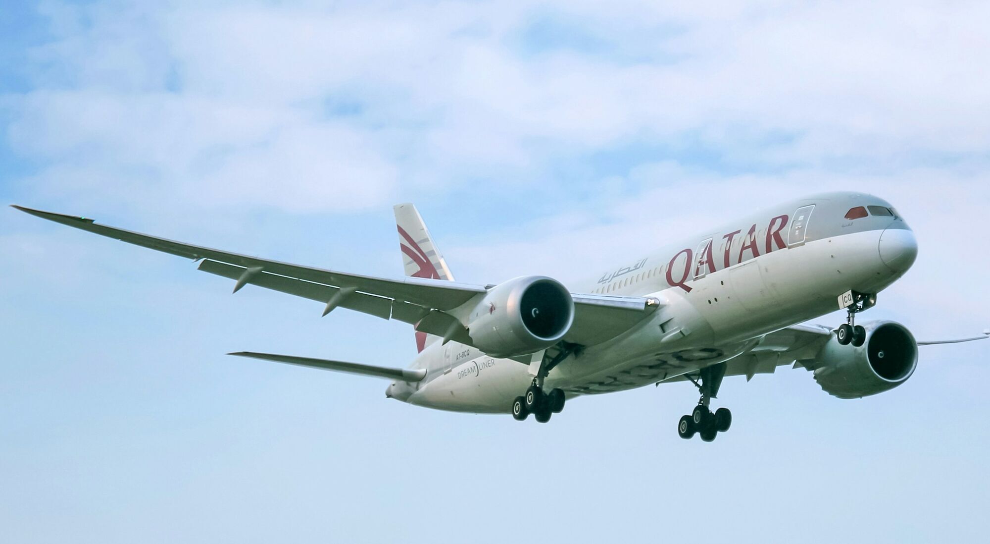 Qatar Airways passenger jet landing at airport