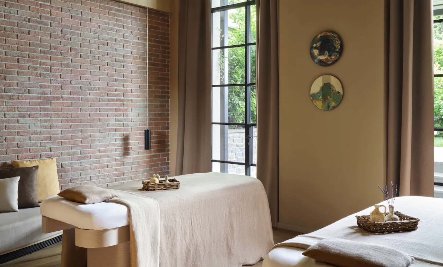 Spa treatment room with neutral tones and natural light