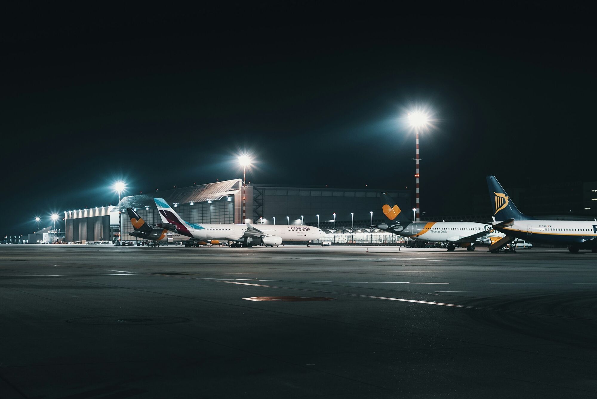 Aircraft parked at Düsseldorf Airport at night