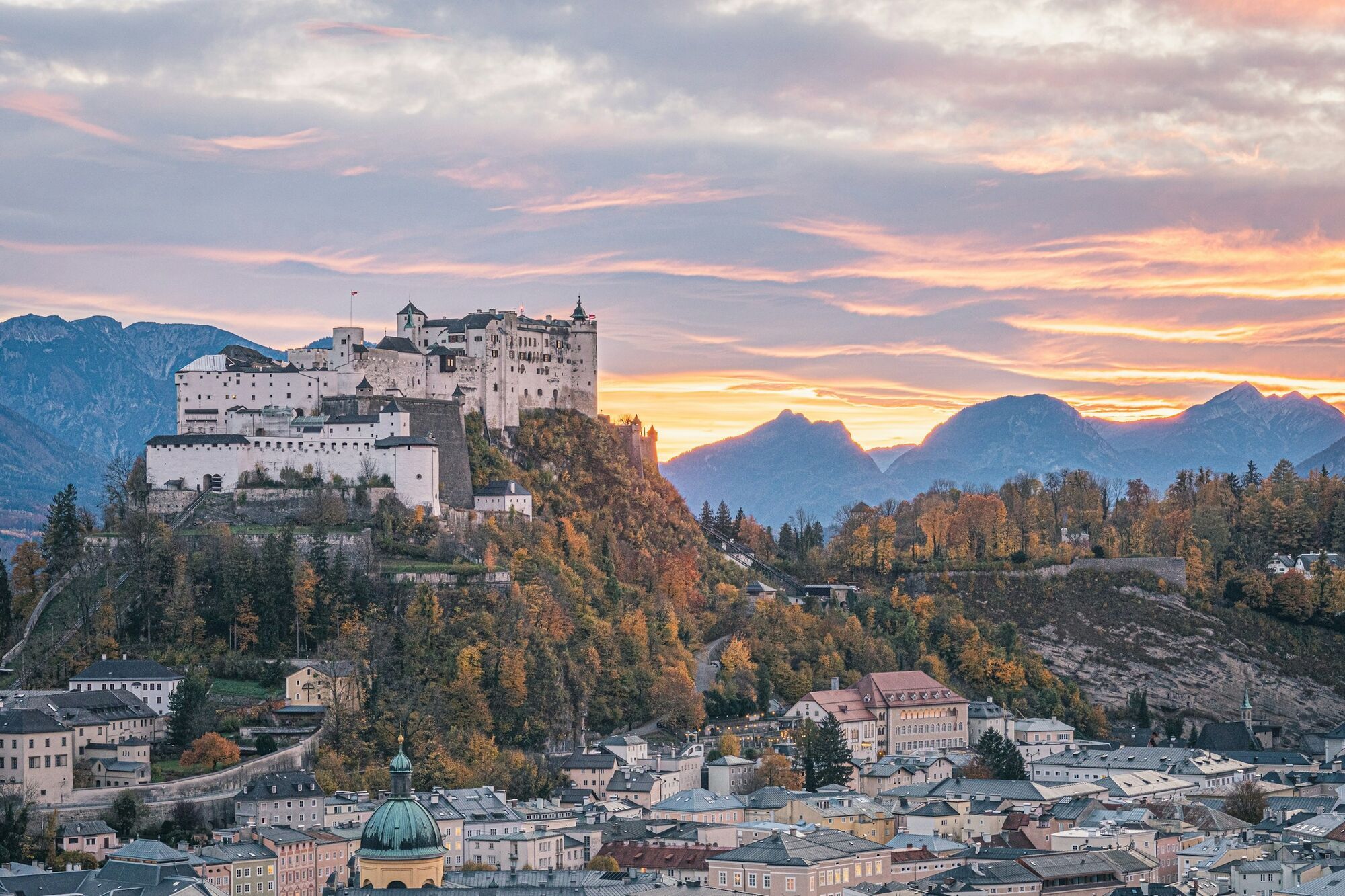 Hohensalzburg Fortress overlooking Salzburg city and mountains