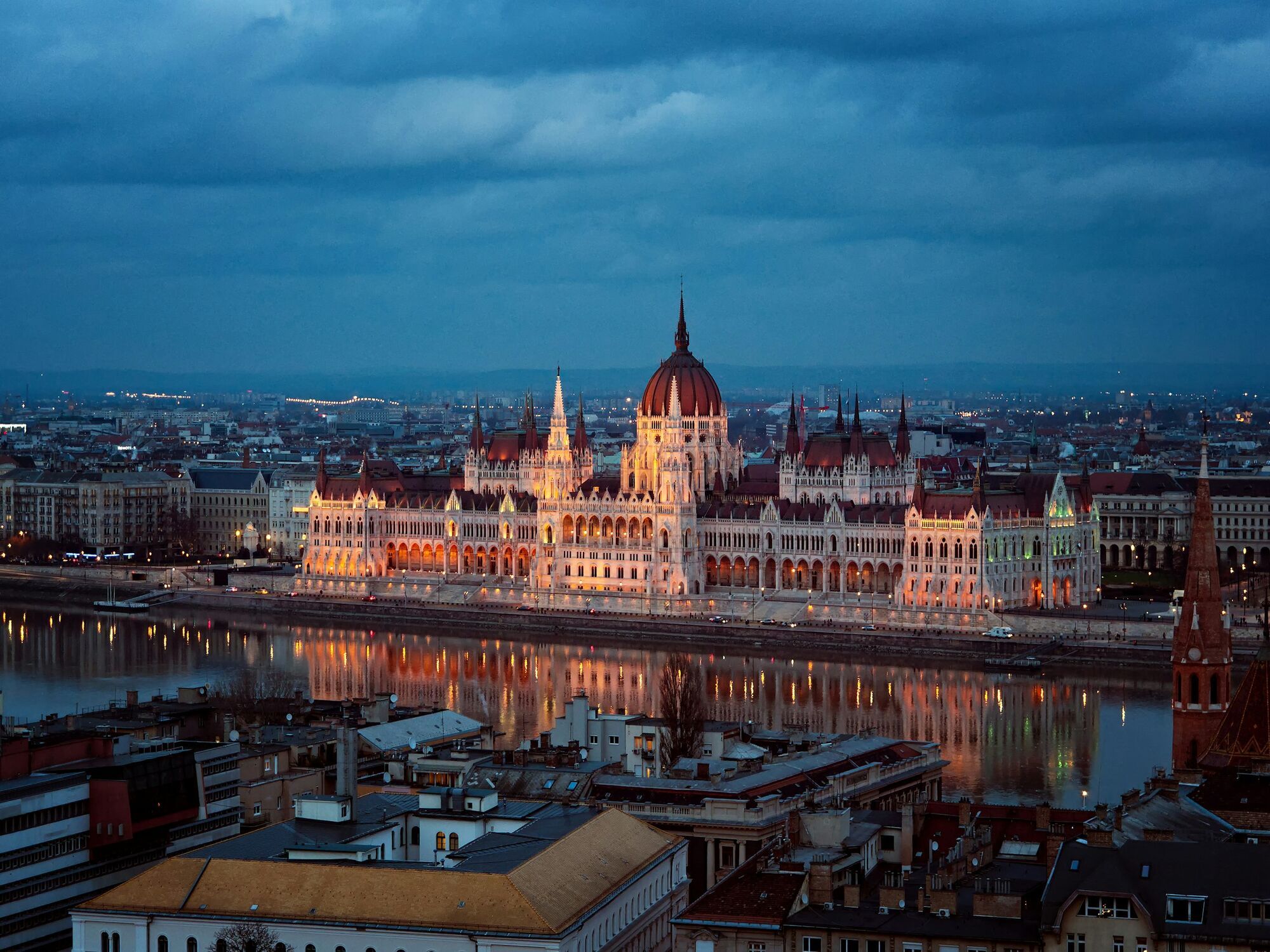Hungarian Parliament building along the Danube in Budapest at dusk