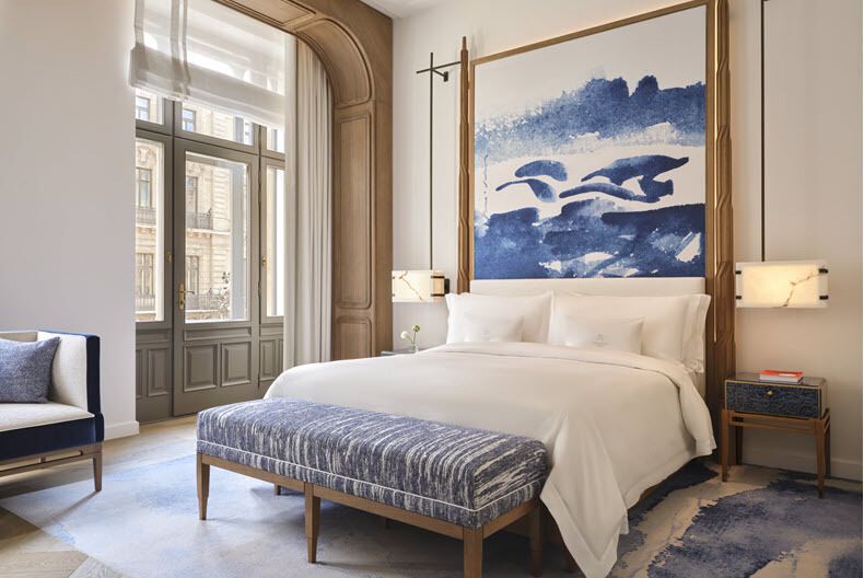 Guest room at The St. Regis Budapest with large windows and classic interior design