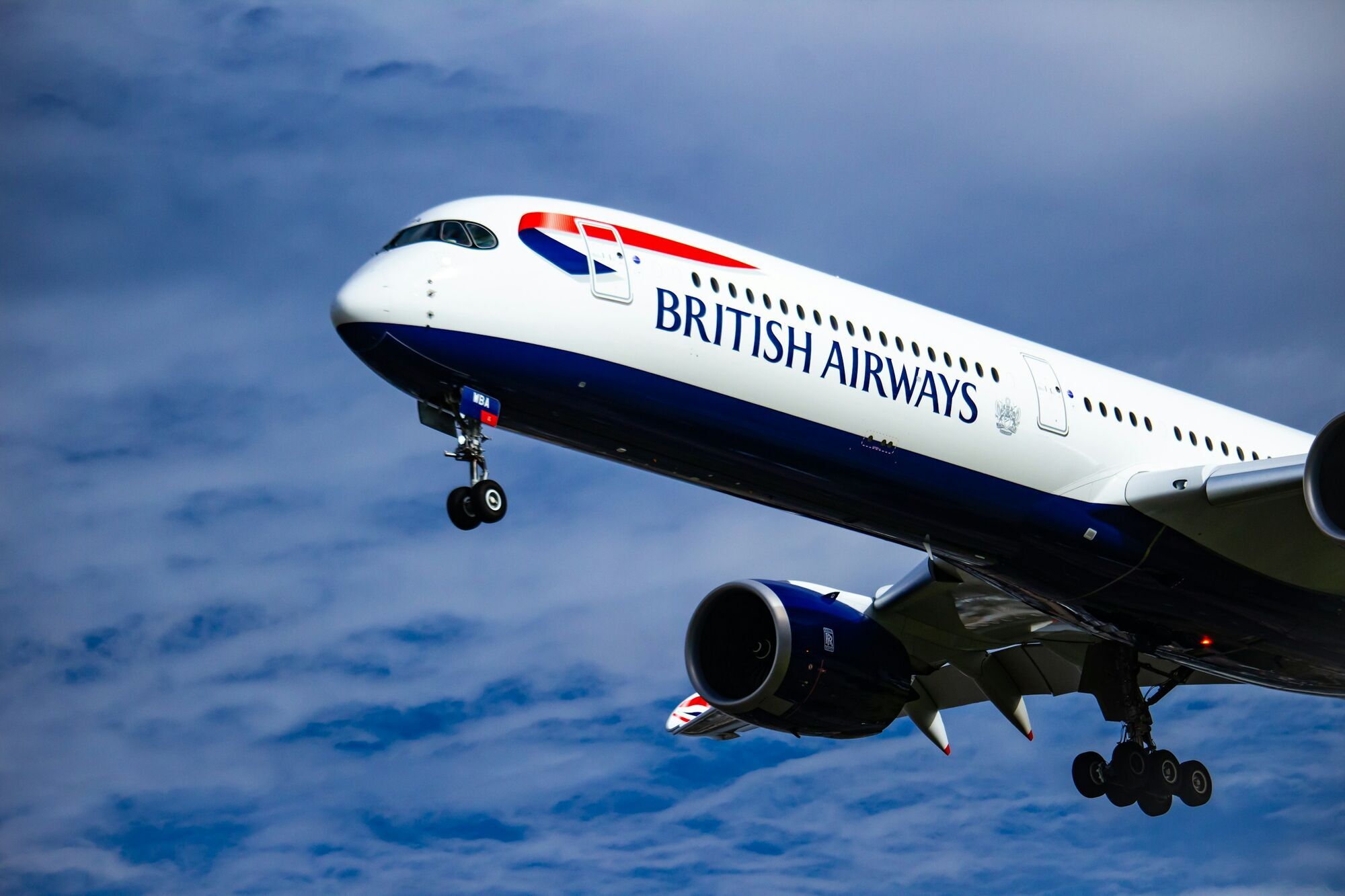 British Airways aircraft flying through clouds