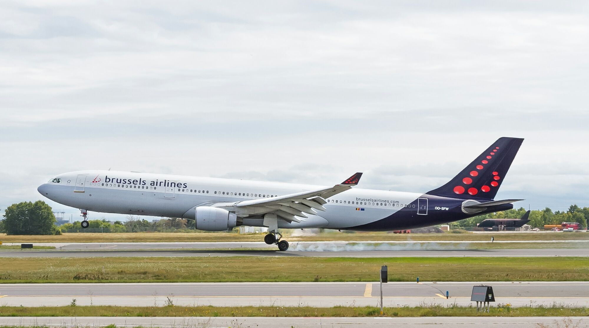 Brussels Airlines aircraft landing on a runway