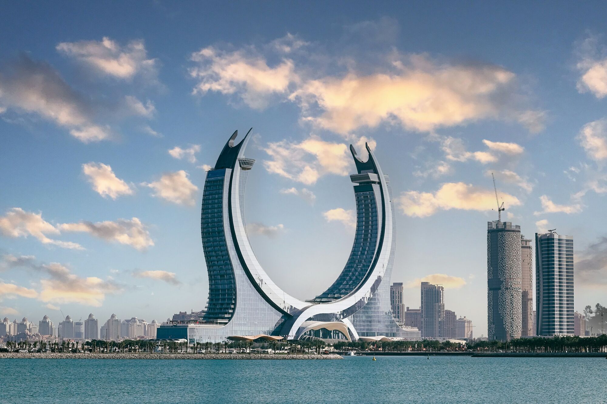 Modern waterfront buildings in Doha beside the sea