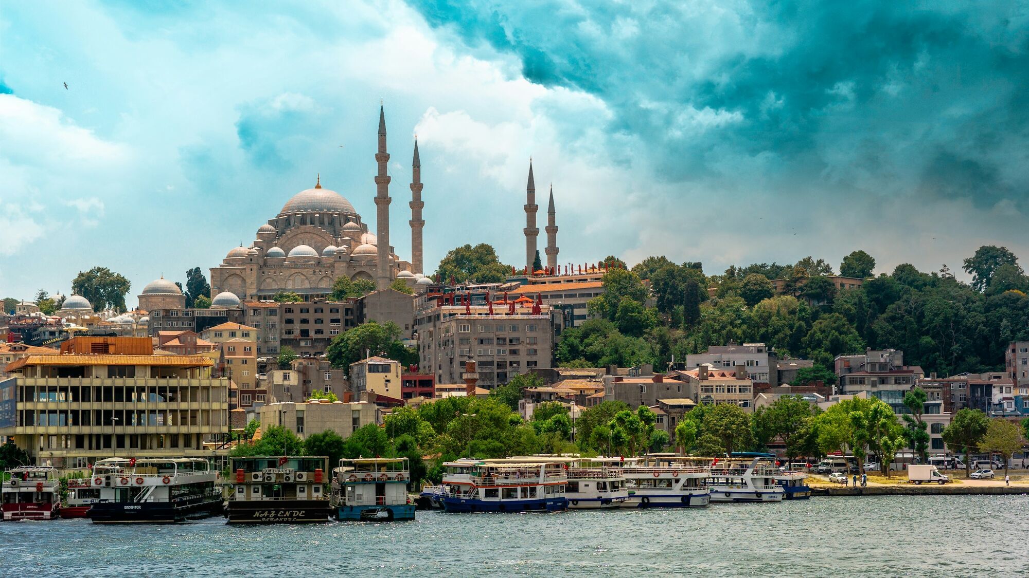 Istanbul waterfront with mosque and boats