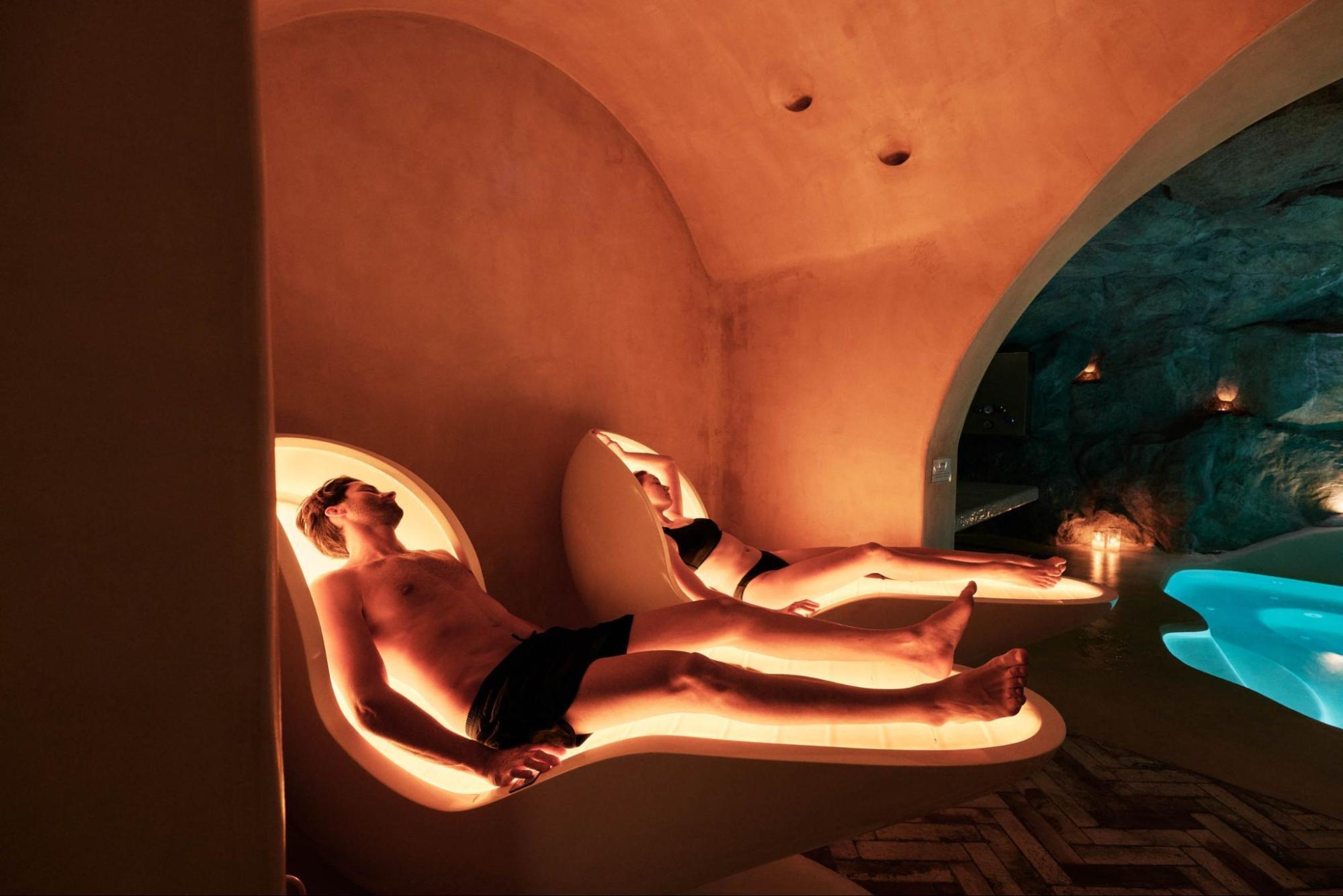 Guests relaxing in the Cave Spa at Kove Mykonos
