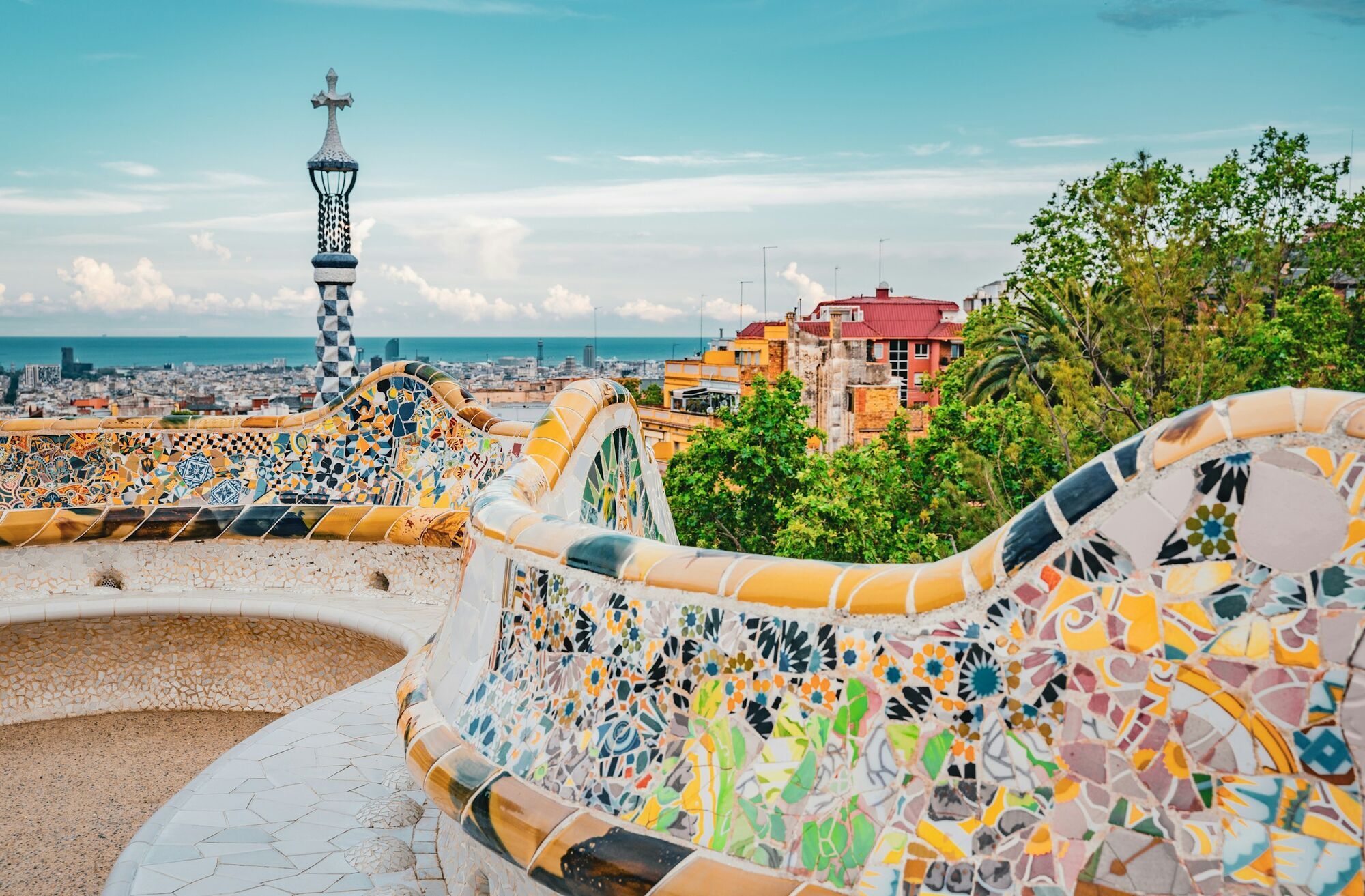 Park Güell in Barcelona with colourful mosaic terraces and city views