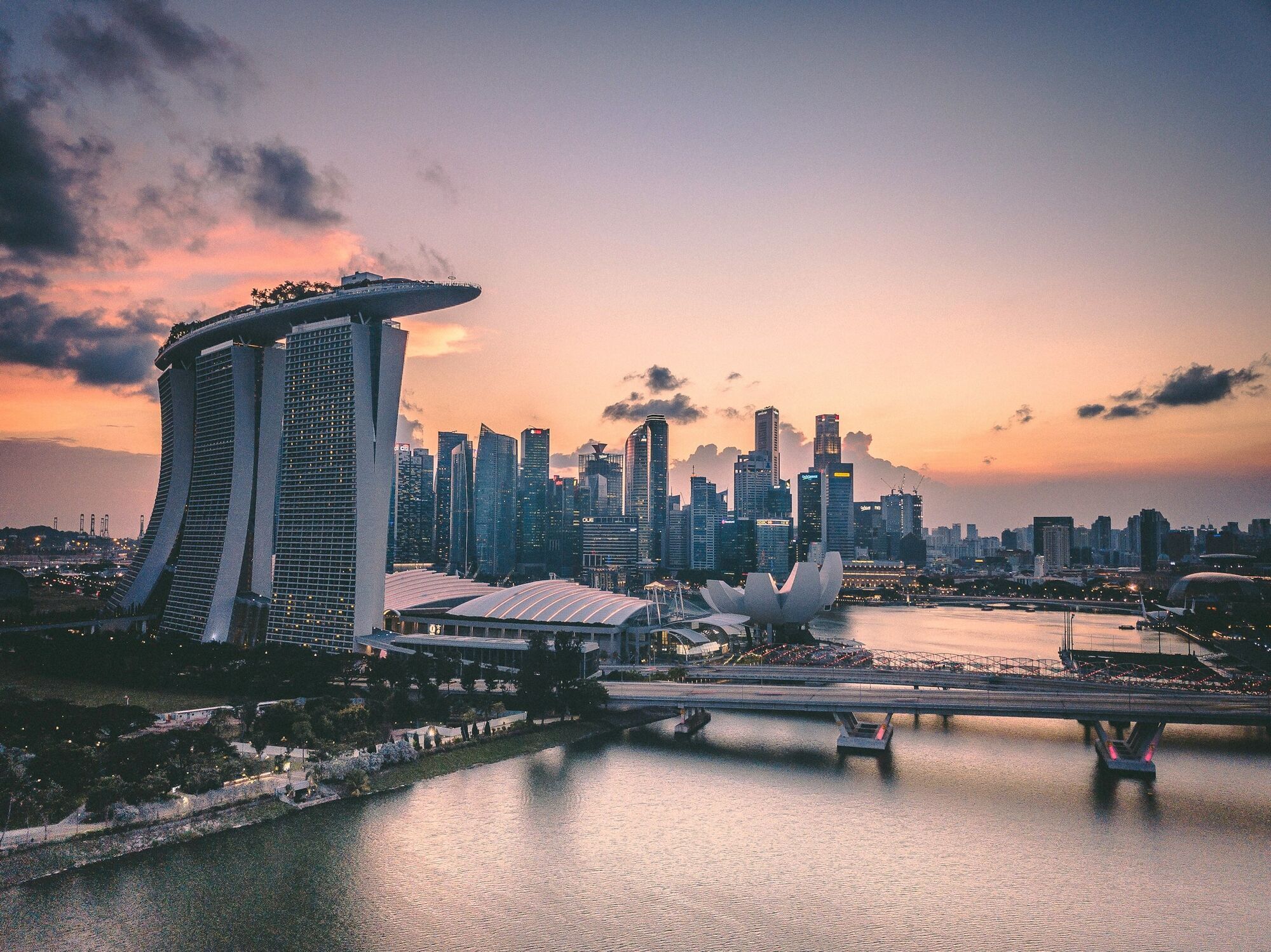 Singapore skyline at sunset over Marina Bay