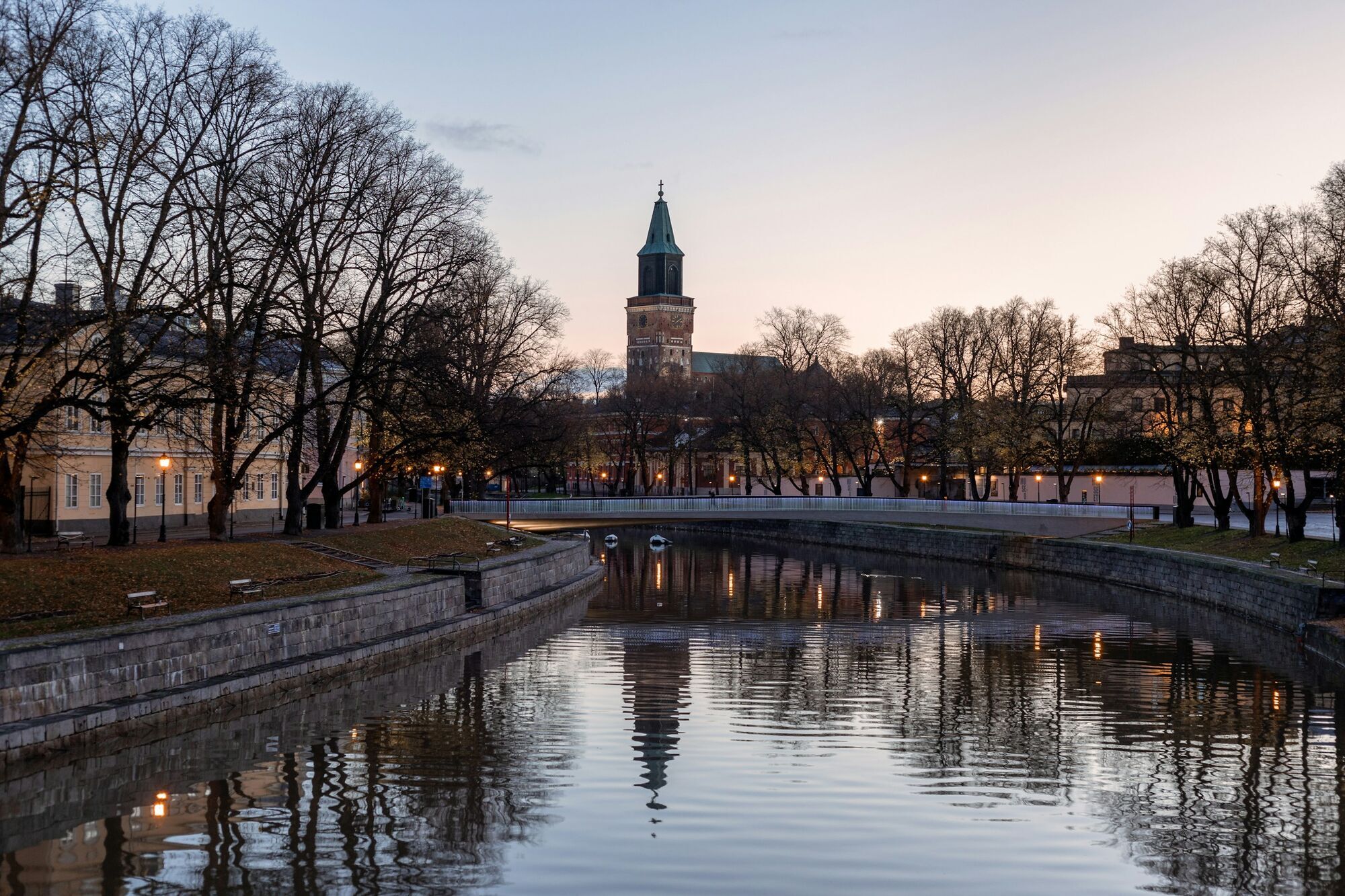 Turku Cathedral seen across the Aura River at dusk